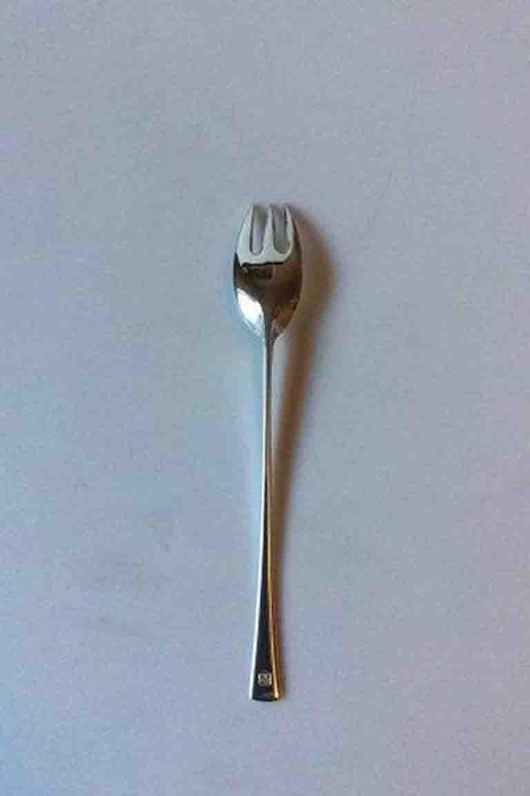 Jens Harald Quistgaard Tjorn sterling silver lunch fork. 

Measures 17.6 cm / 6 59/64