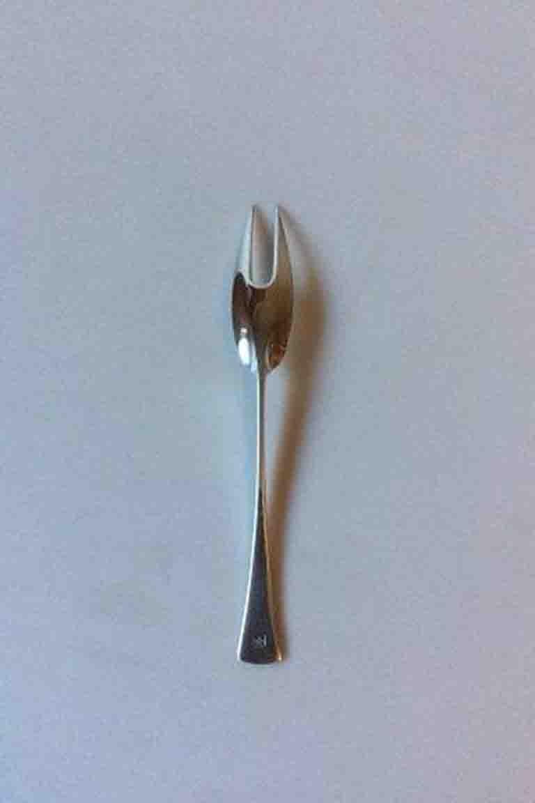 Jens Harald Quistgaard Tjorn sterling silver meat fork. 

Measures 19.2 cm / 7 9/16