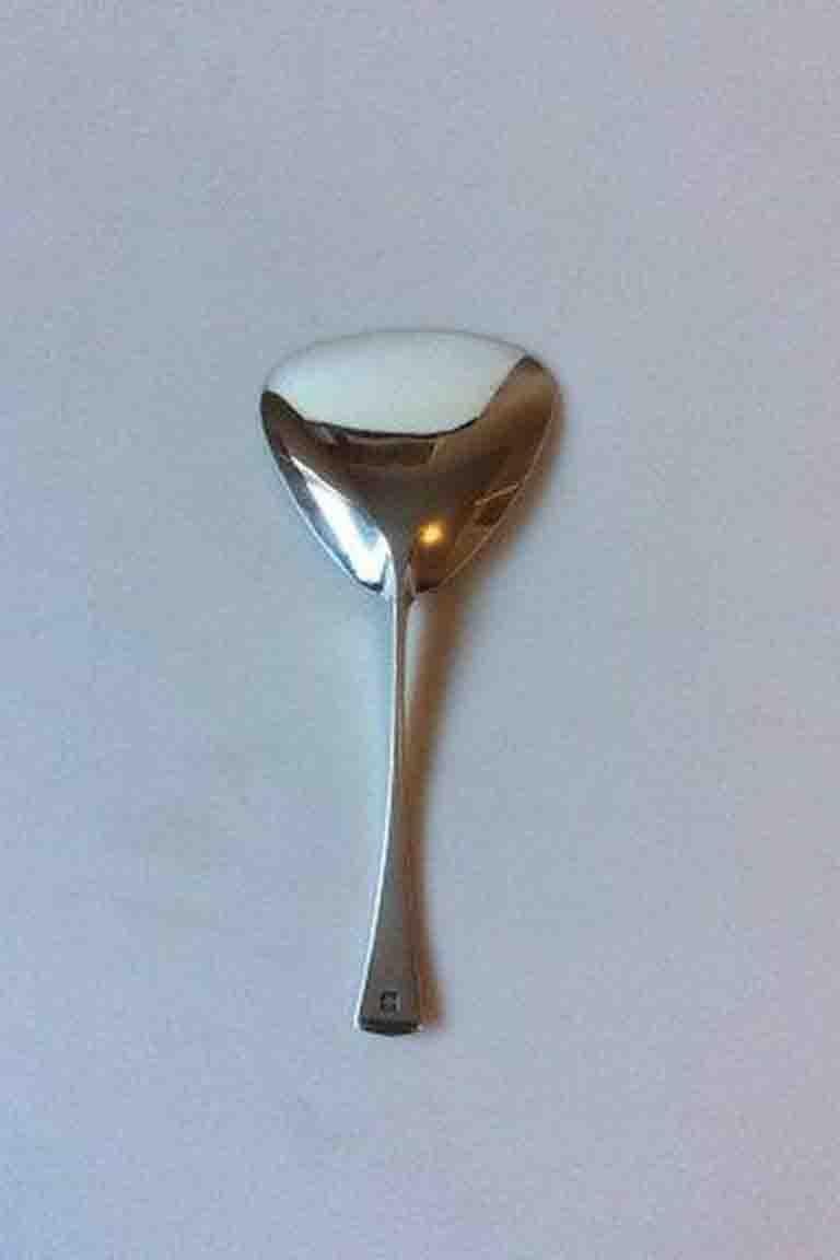 Jens Harald Quistgaard Tjorn sterling silver serving spoon. 

Measures 19.3 cm / 7 19/32