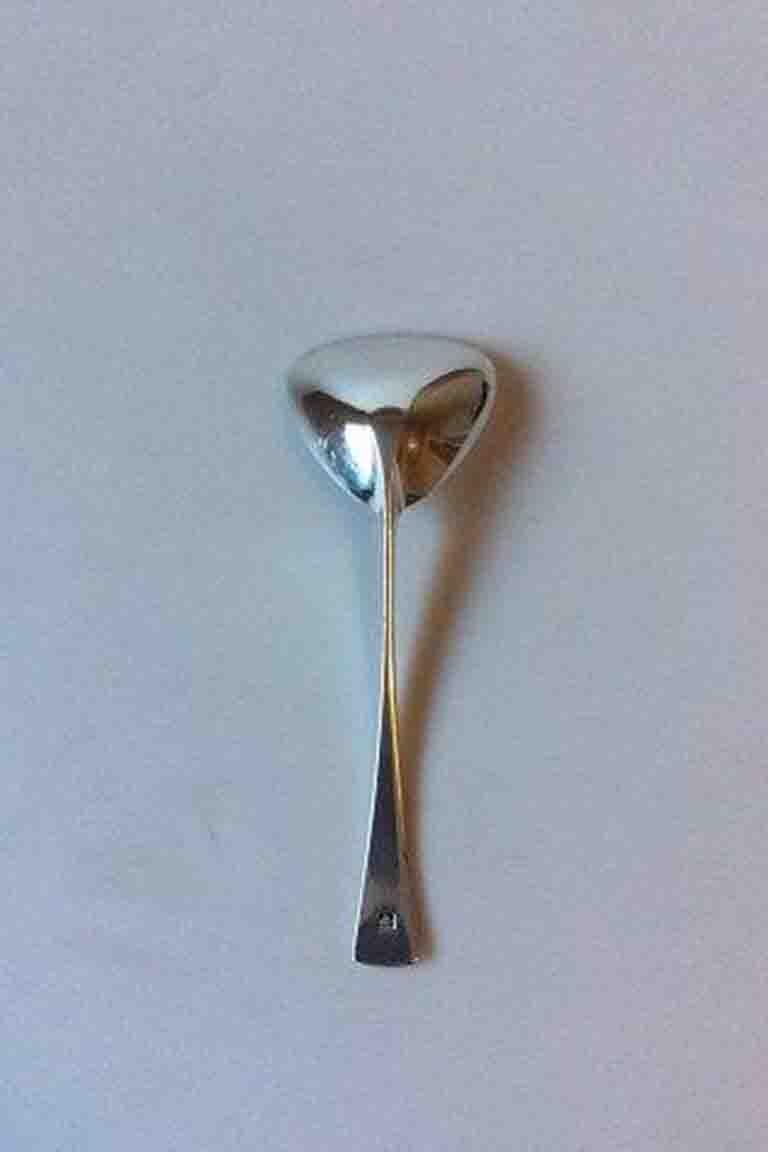 Jens Harald Quistgaard Tjorn sterling silver serving spoon. 

Measures 16.7 cm / 6 37/64