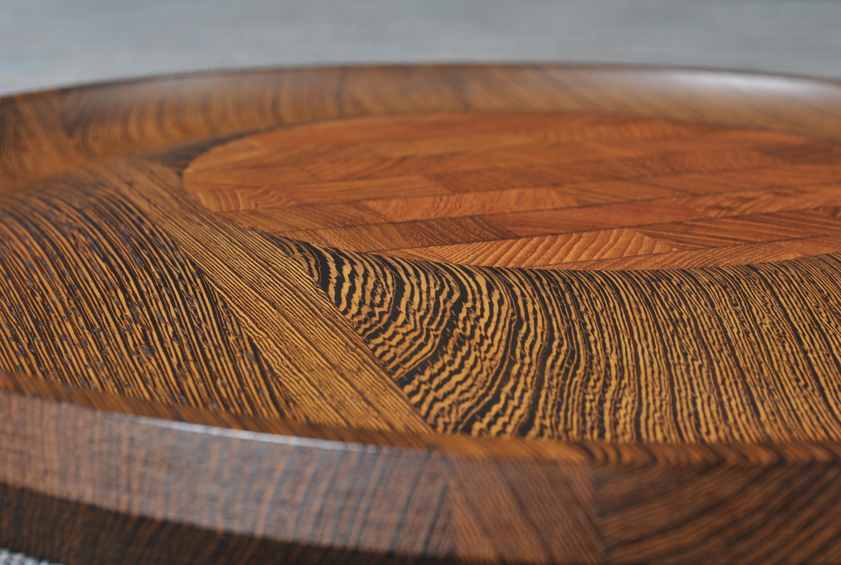 A very rare platter - presentation board by Jens Harald Quistgaard. Beautifully turned Wenge timber with circular raised centre in squared end grain and concave base. Produced in Denmark, circa 1960. Incredible craftsmanship.
In lovely condition -
