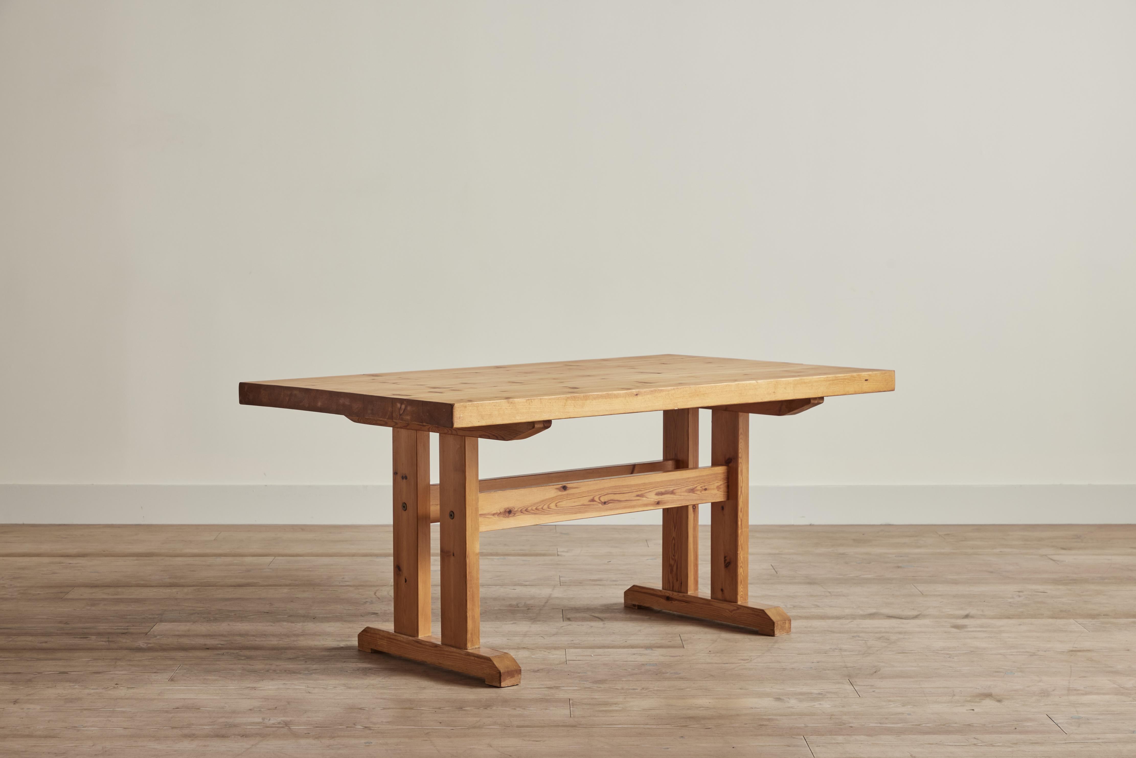 Pine wood dining table in the style of Danish designer Jens Lyngsoe circa 1970. Table has been cleaned and waxed for its new home. Wear on wood is consistent with age and use.