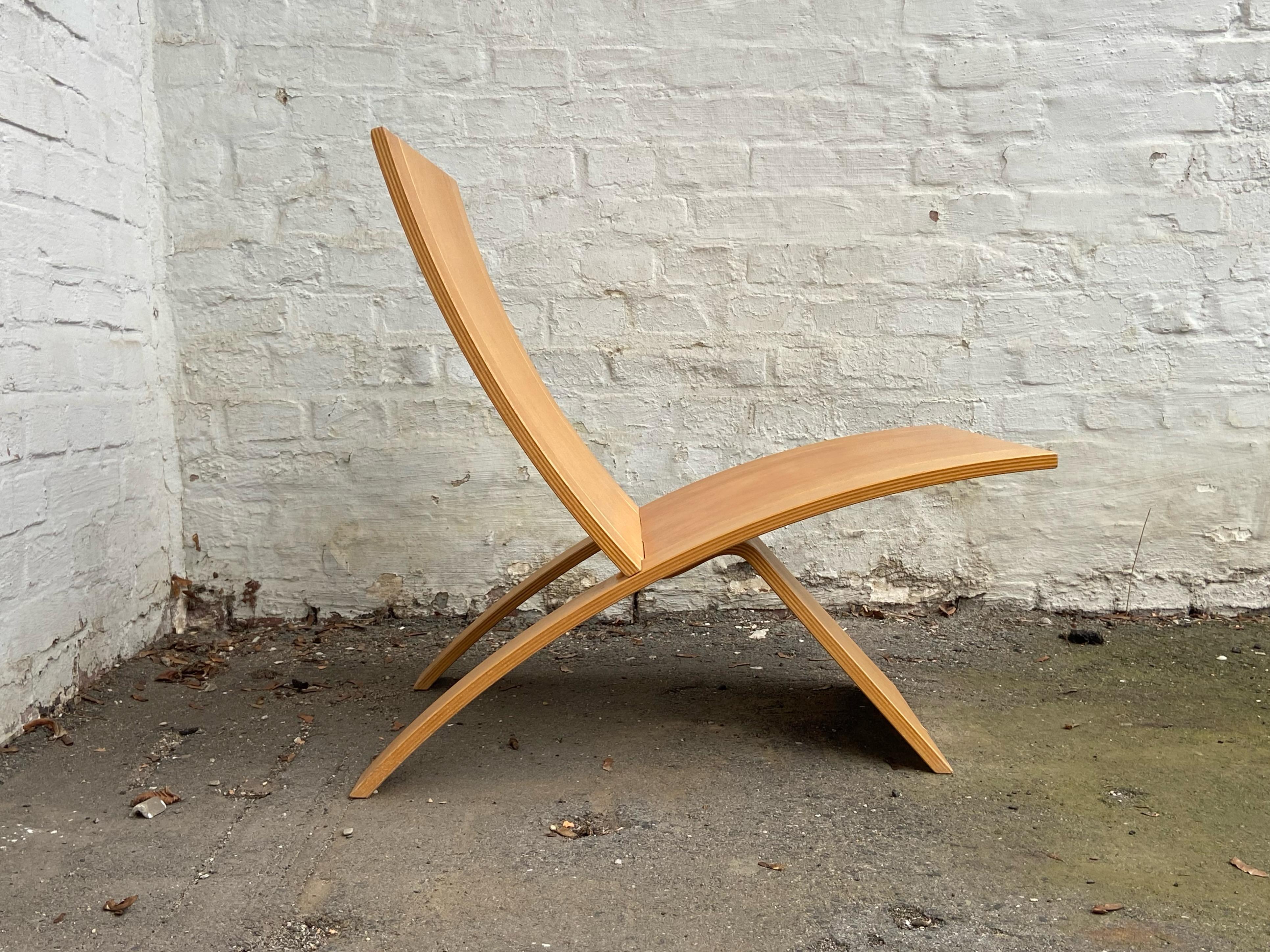 Jens Nielsen Laminex lounge / easy chair designed produced by Westnofa, Norway in 1966. The chair is constructed of two ingeniously integrated panels that are also very easy to disassemble again. It is made in birch plywood and the chair exist in