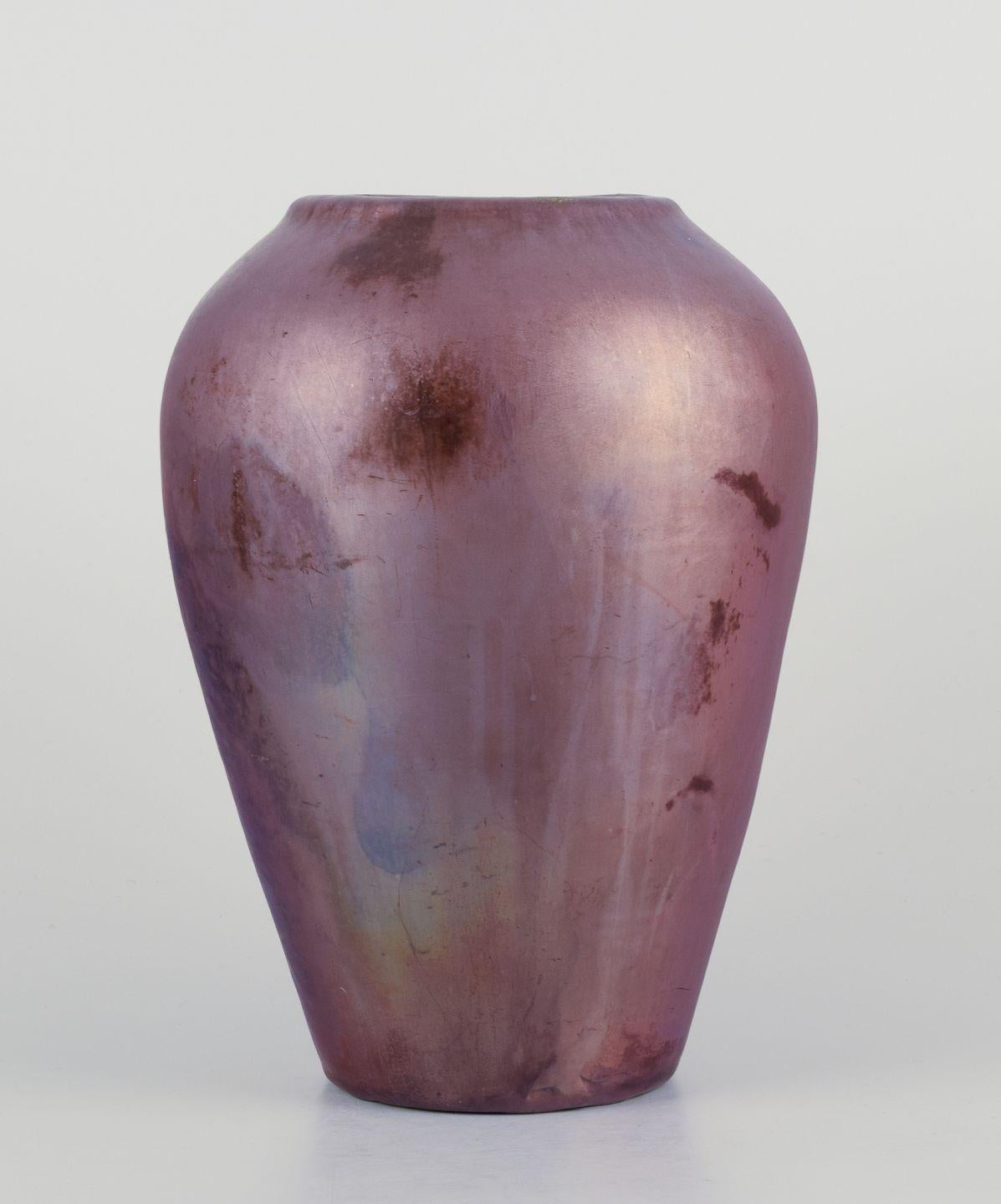 Pre-owned goods are exempt from import duties for U.S. customers. 
Therefore, no import tariffs will be applicable to your purchase.

Jens Petersen (1890-1956), Danish ceramic artist.
Large vase in shiny lustre glaze. 
Hand-glazed.
Circa