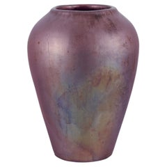 Jens Petersen, Danish ceramic artist. Large vase in shiny lustre glaze. Ca. 1920
