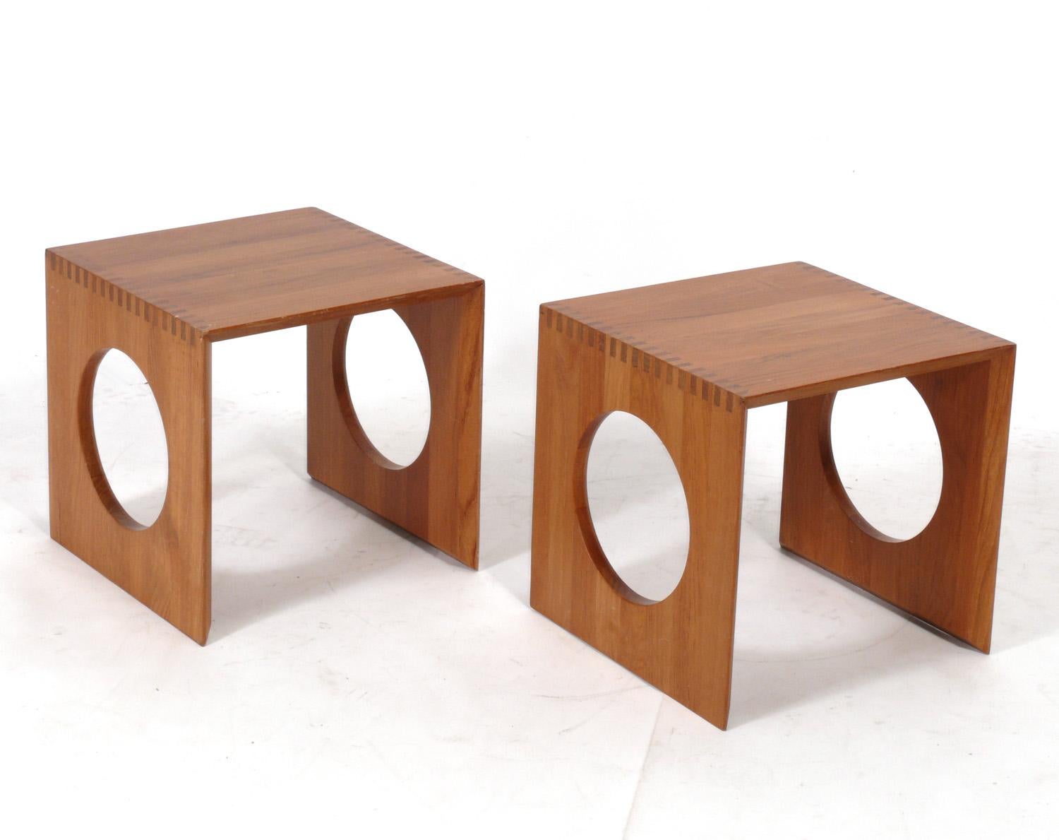 Pair of Danish Modern teak cube tables, designed by Jens Quistgaard for Richard Nissen, Denmark, circa 1980s. They are an ingenious design and can be stacked inside one another to form a complete cube. They are a versatile size and can be used as