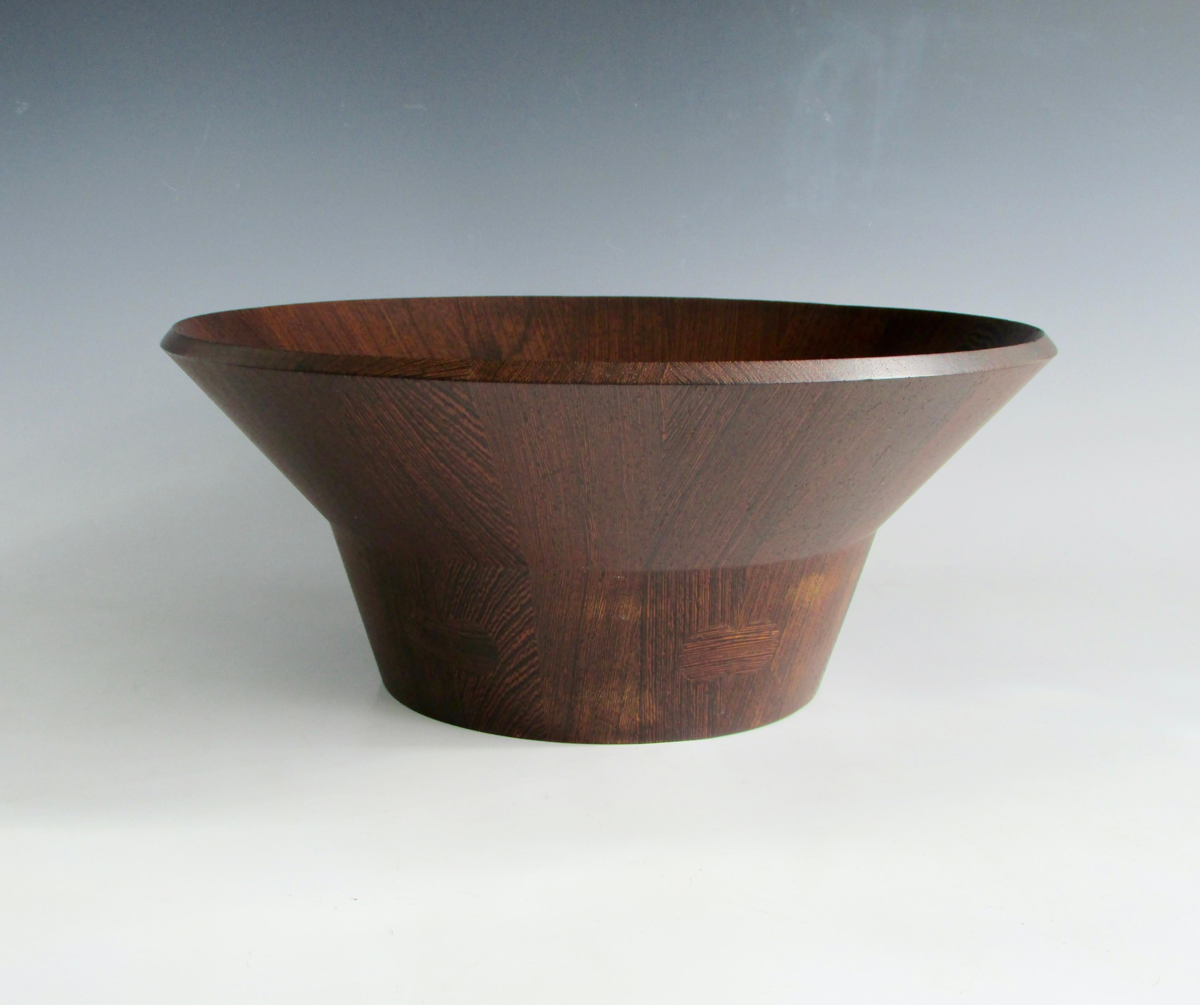 Rare Danish Modern flared salad or fruit bowl designed by Jens Harald Quistgaard ( JHQ ) for Dansk Designs, Denmark . Introduced in 1961 'Rare Woods’ Limited Edition collection. Scandinavian Modern at its best . Flared side slide into opening of