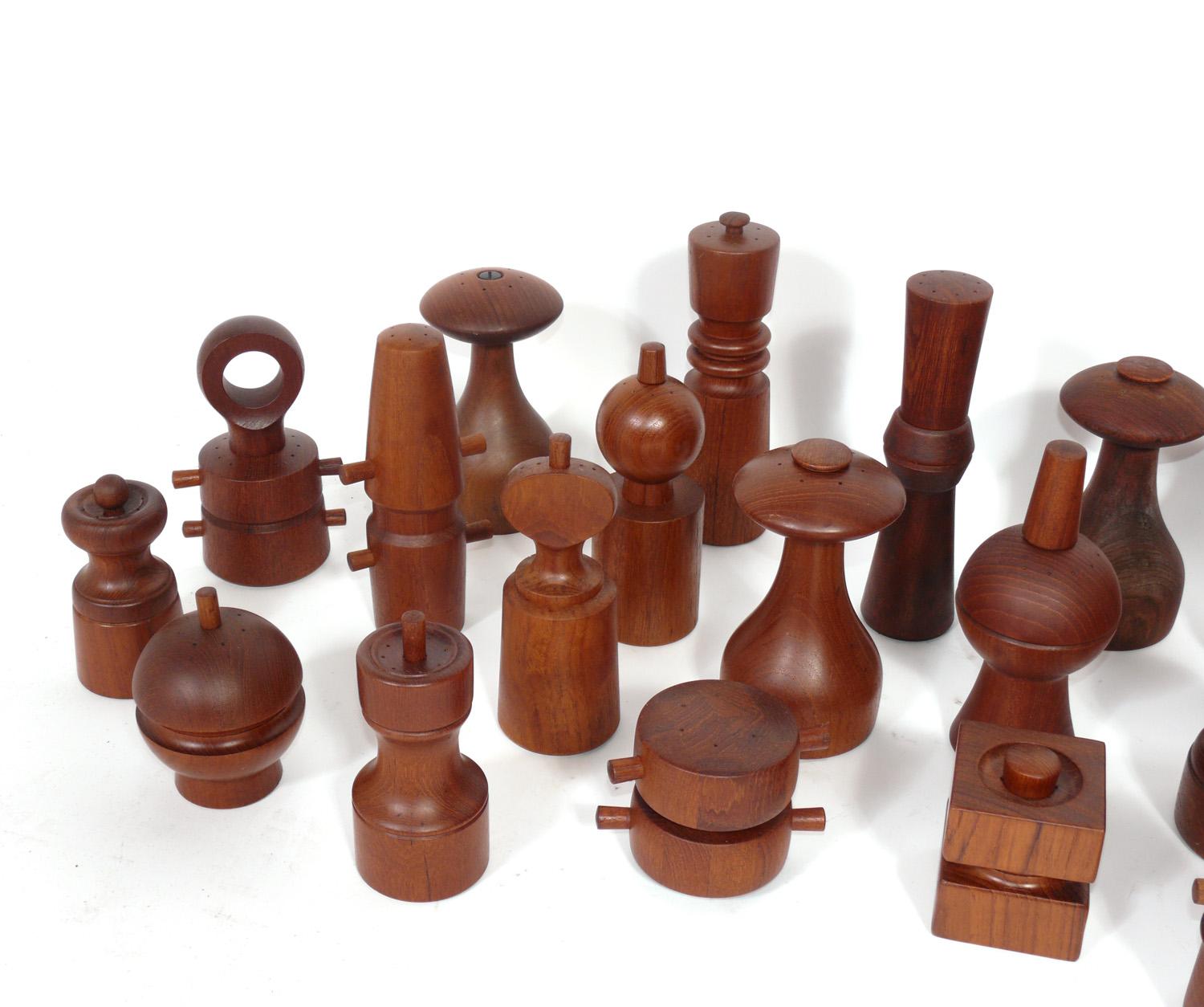 Sculptural Danish Modern Pepper Mill collection, designed by Jens Quistgaard for Dansk, Denmark, circa 1960s. The collection consists of 36 pepper mills. The largest measures 9