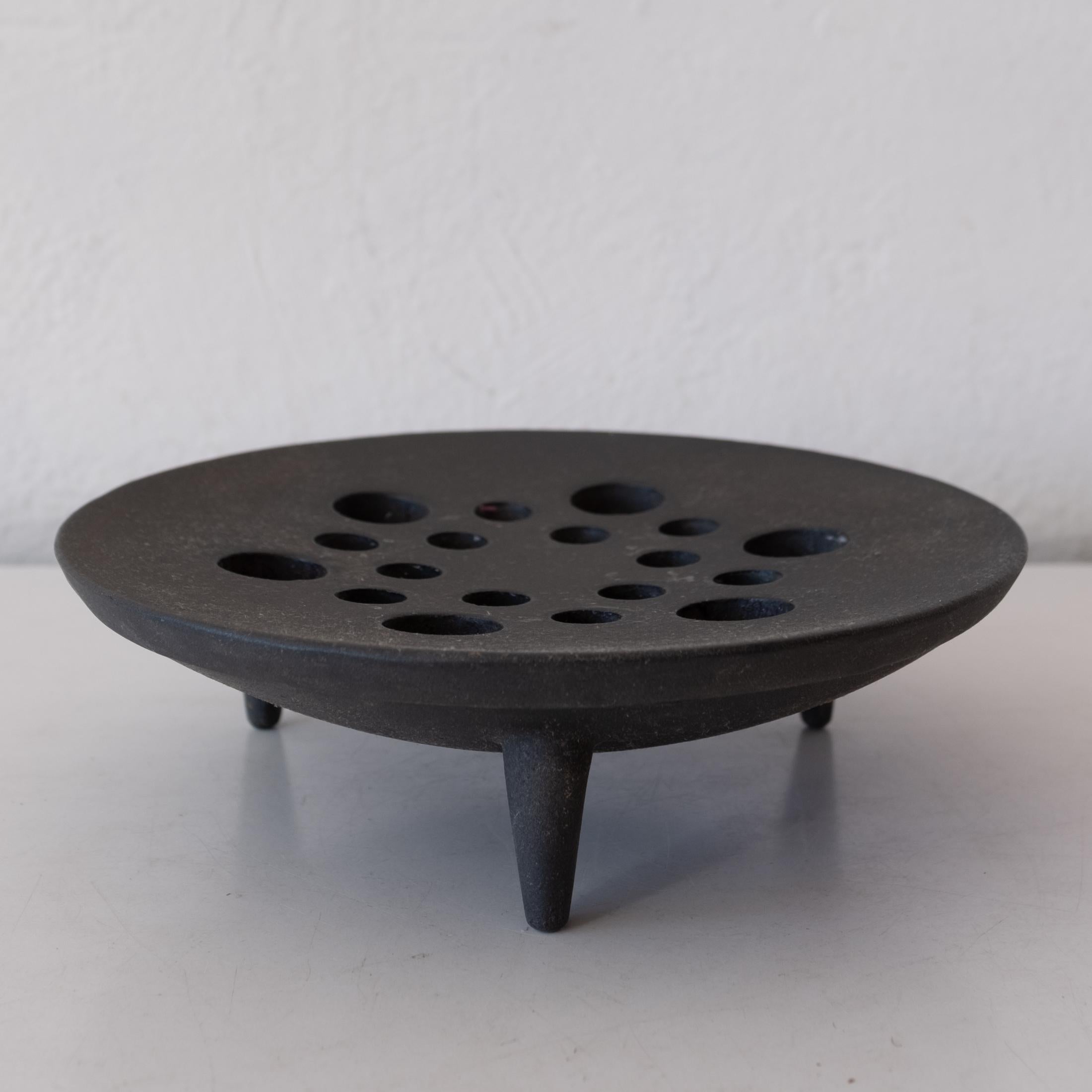Jens Quistgaard tripod cast iron candle or incense holder by Dansk with original box. The modernist design looks great as just an object. 1950s. Made in Denmark.