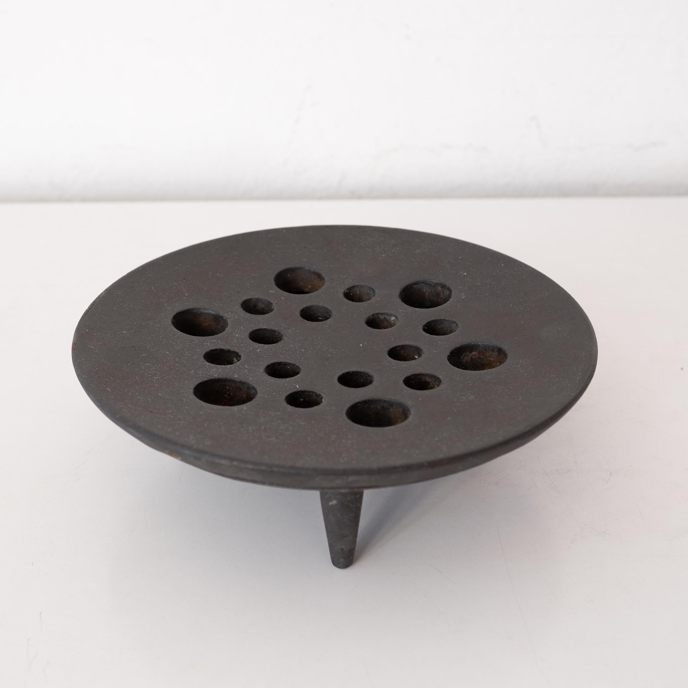 Jens Quistgaard tripod cast iron candle or incense holder by Dansk. The modernist design looks great as just an object. 1950s. Made in Denmark.