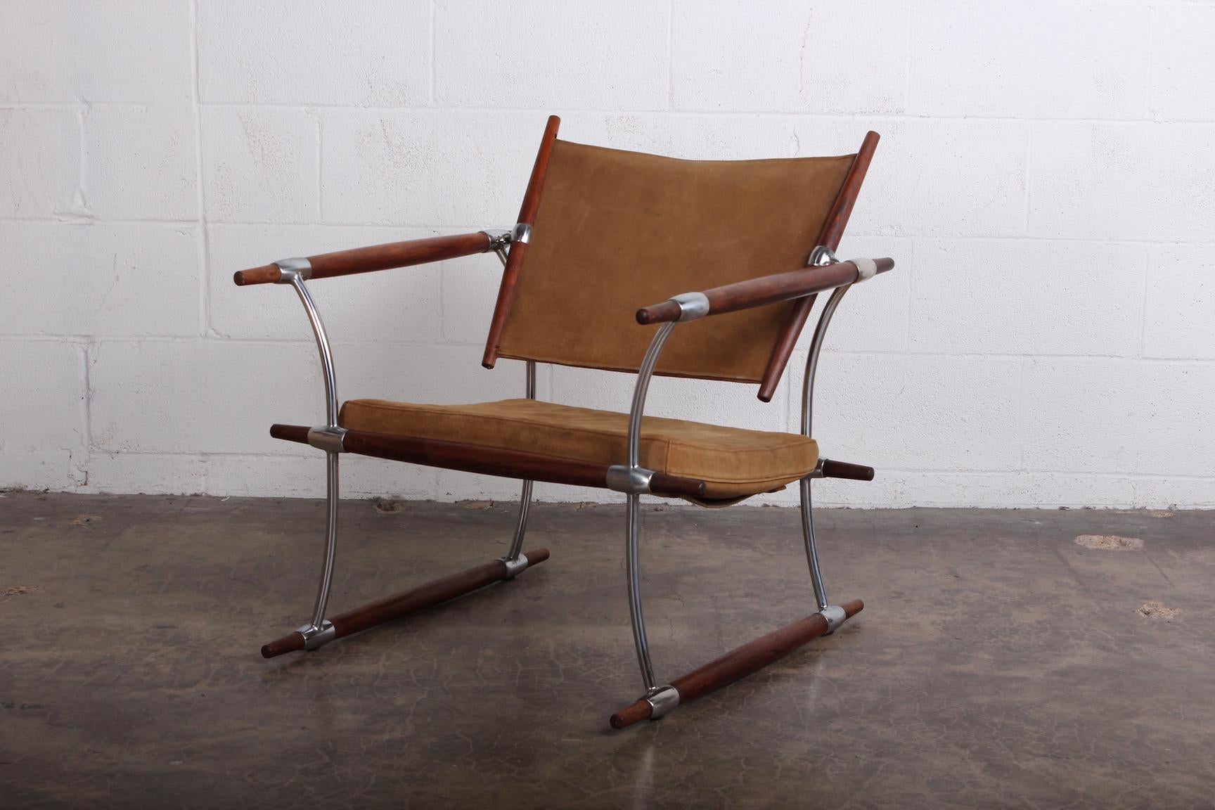 A rosewood and suede 