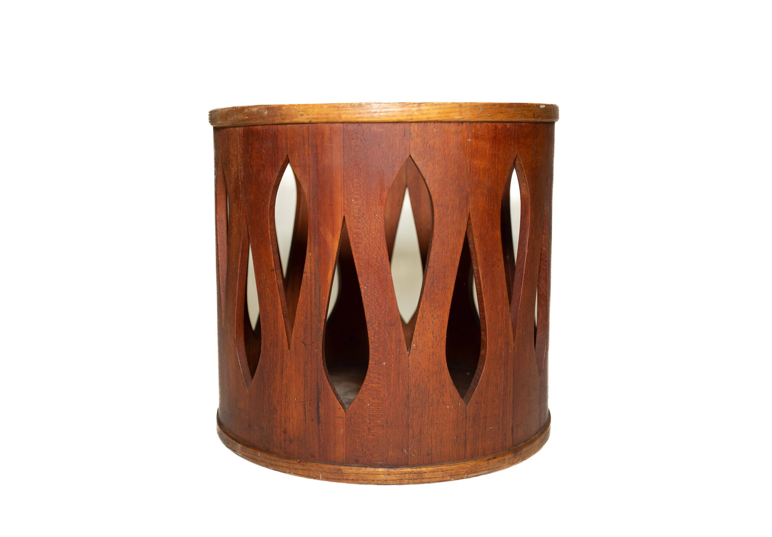 A teak waste can designed by Jens Quistgaard For Dansk.