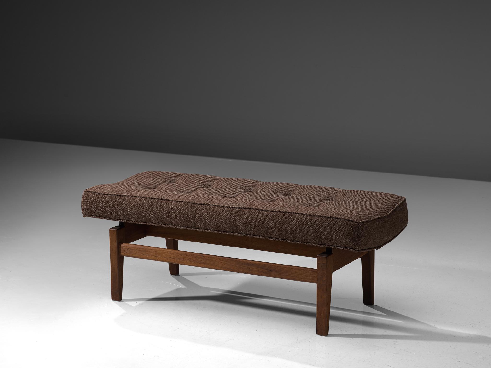 Jens Risom bench in solid walnut and brown fabric, USA, 1960s

This small bench by Risom is well crafted in walnut, with an open frame. This brown woolen fabric is in great condition. 
The modesty of the design is characteristic for the work of