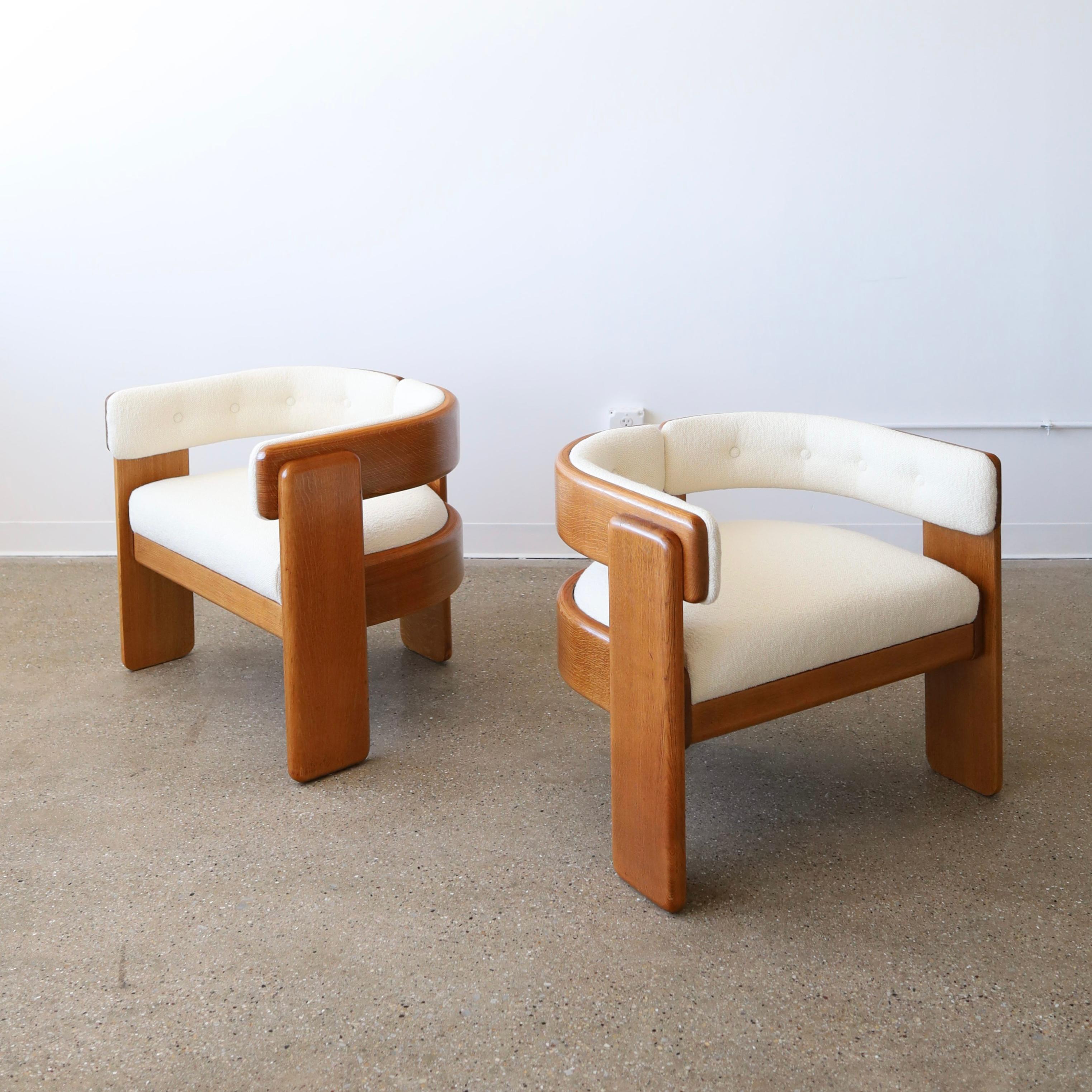 Both chairs have been fully refinished, have new foam, and have been reupholstered in Maharam “Hearth Fabric” - these chairs feature solid, white oak frames that have been steam-bent. While they’ve been restored, there are some minor flaws including