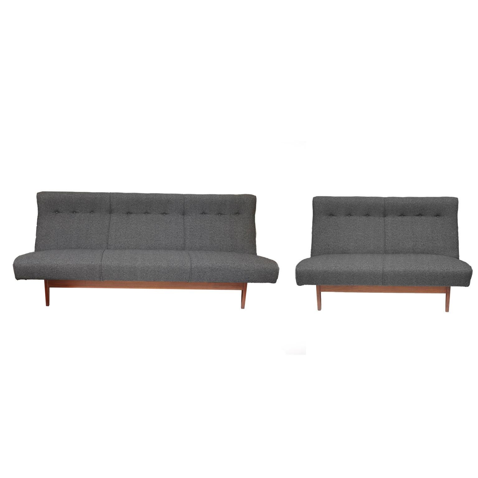 Beautiful matching Mid-Century Modern Jens Risom sofa and matching love seat. Newly upholstered in charcoal grey Kravet fabric. New foam. Hard to find matching set.