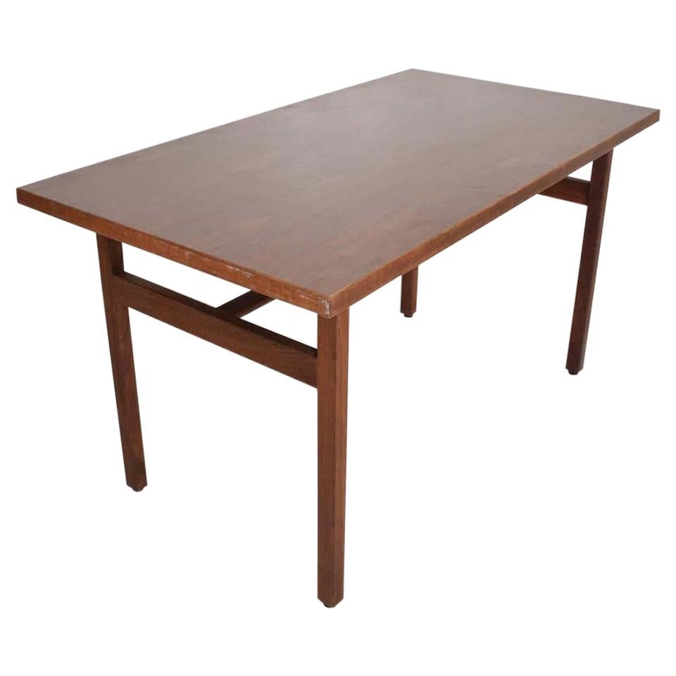 Modernist designer Jens Risom of Denmark: Scandinavian floating walnut writing table entryway desk 1950s
Wonderful compact size ideal for narrow dining table option.
Warm Walnut wood with a Formica top.
Retains Original label underneath. Jens Risom