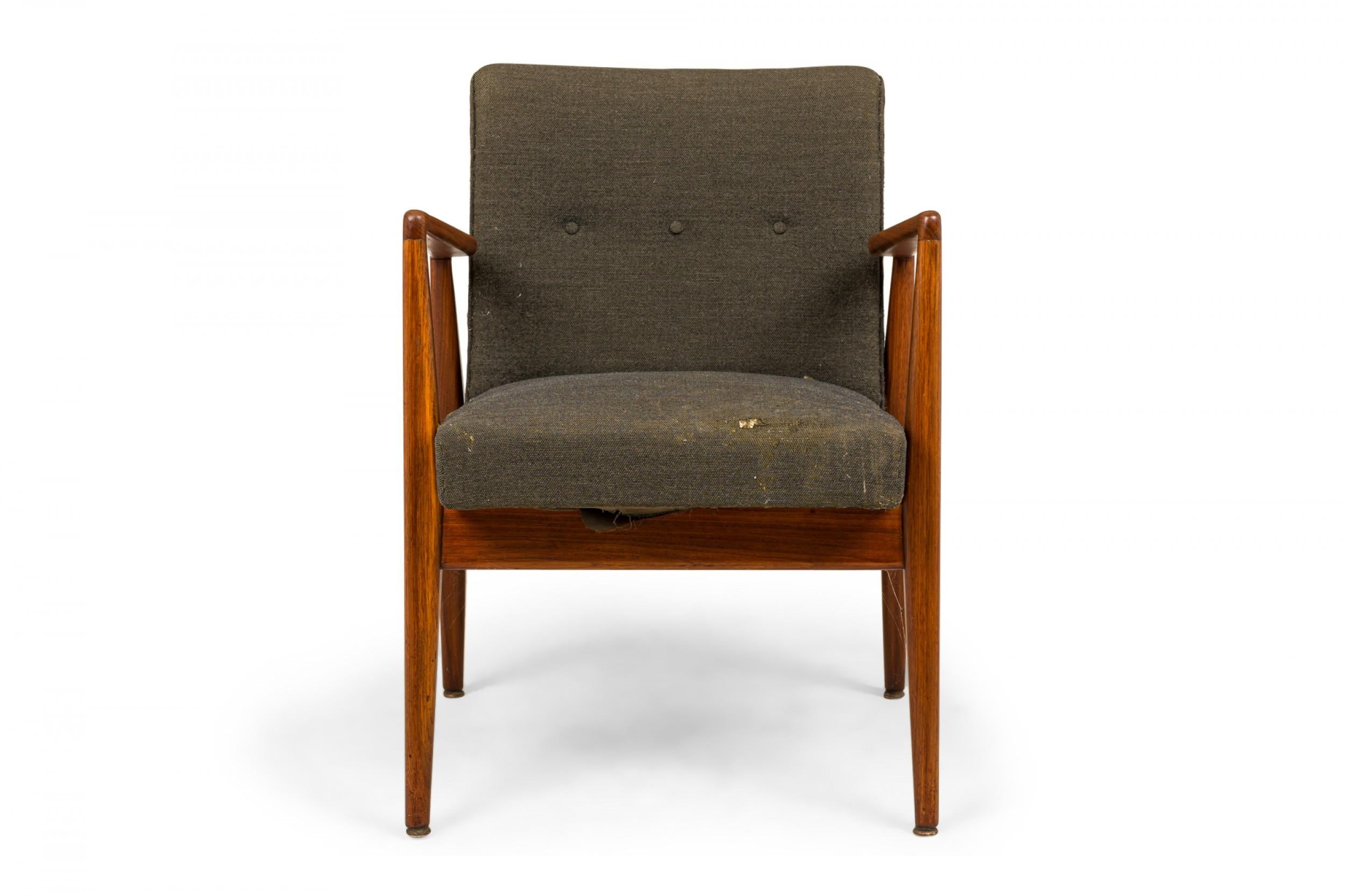 Danish Mid-Century 'Playboy' armchair with and angular teak wood frame and gray woven fabric upholstered seat and back with button tufting. (JENS RISOM)
