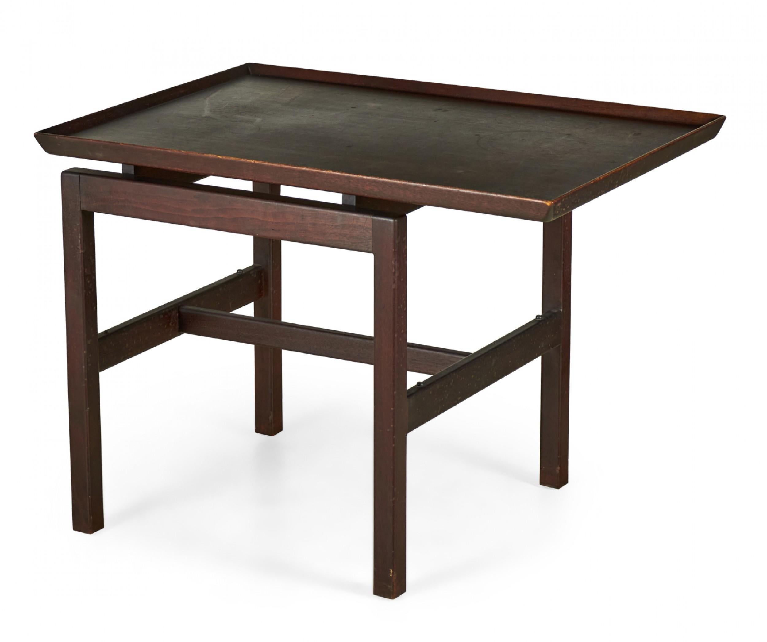 Danish Mid-Century dark stained walnut cantilever side / end table with a rectangular off-center tabletop with shallow gallery supported by a walnut stretcher base. (JENS RISOM)(Available in lighter finish: DUF0103)
