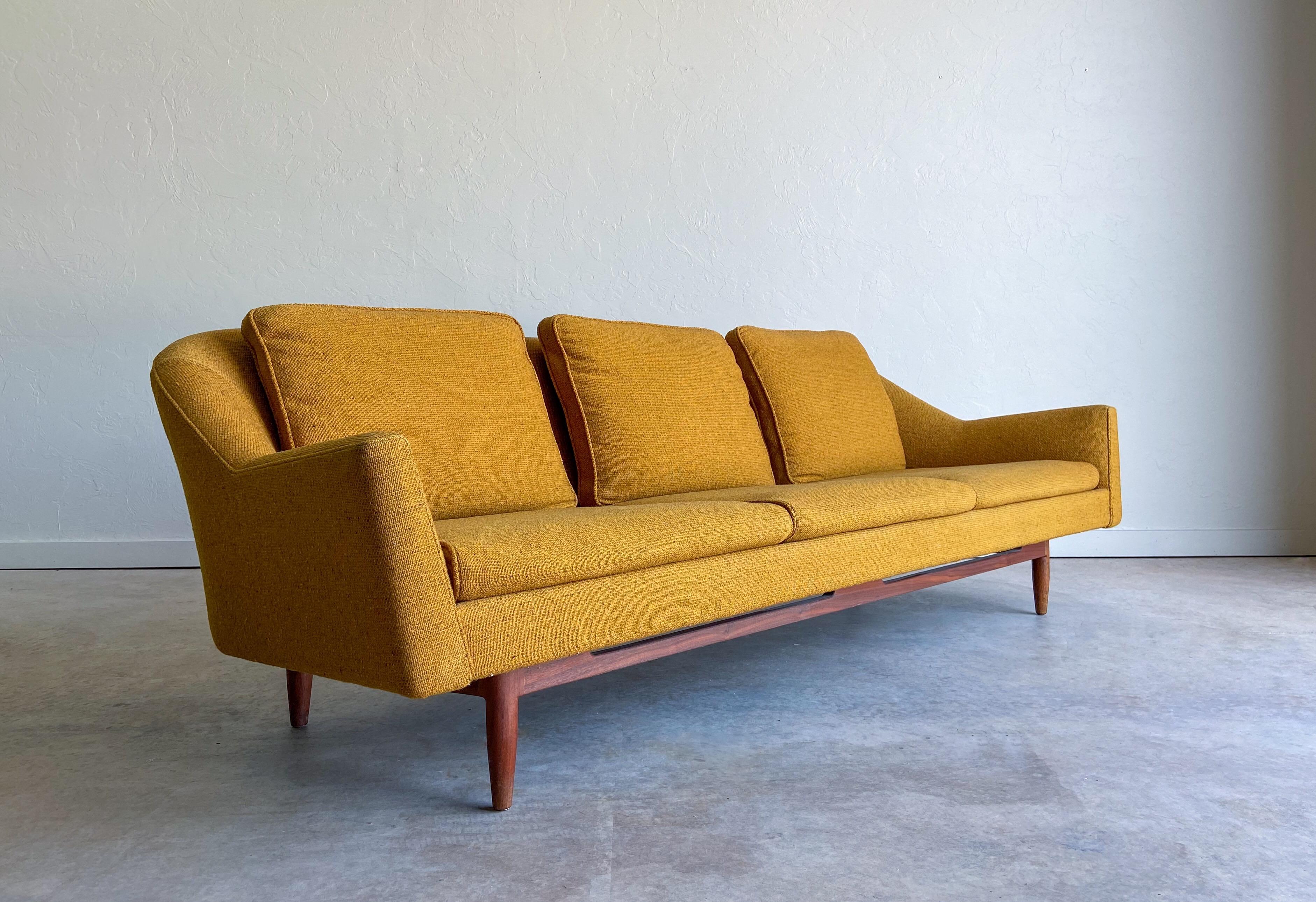 A Danish modern sofa designed by Jens Risom for Jens Risom Design Inc. Form and function come together on this beautiful and comfortable sofa.