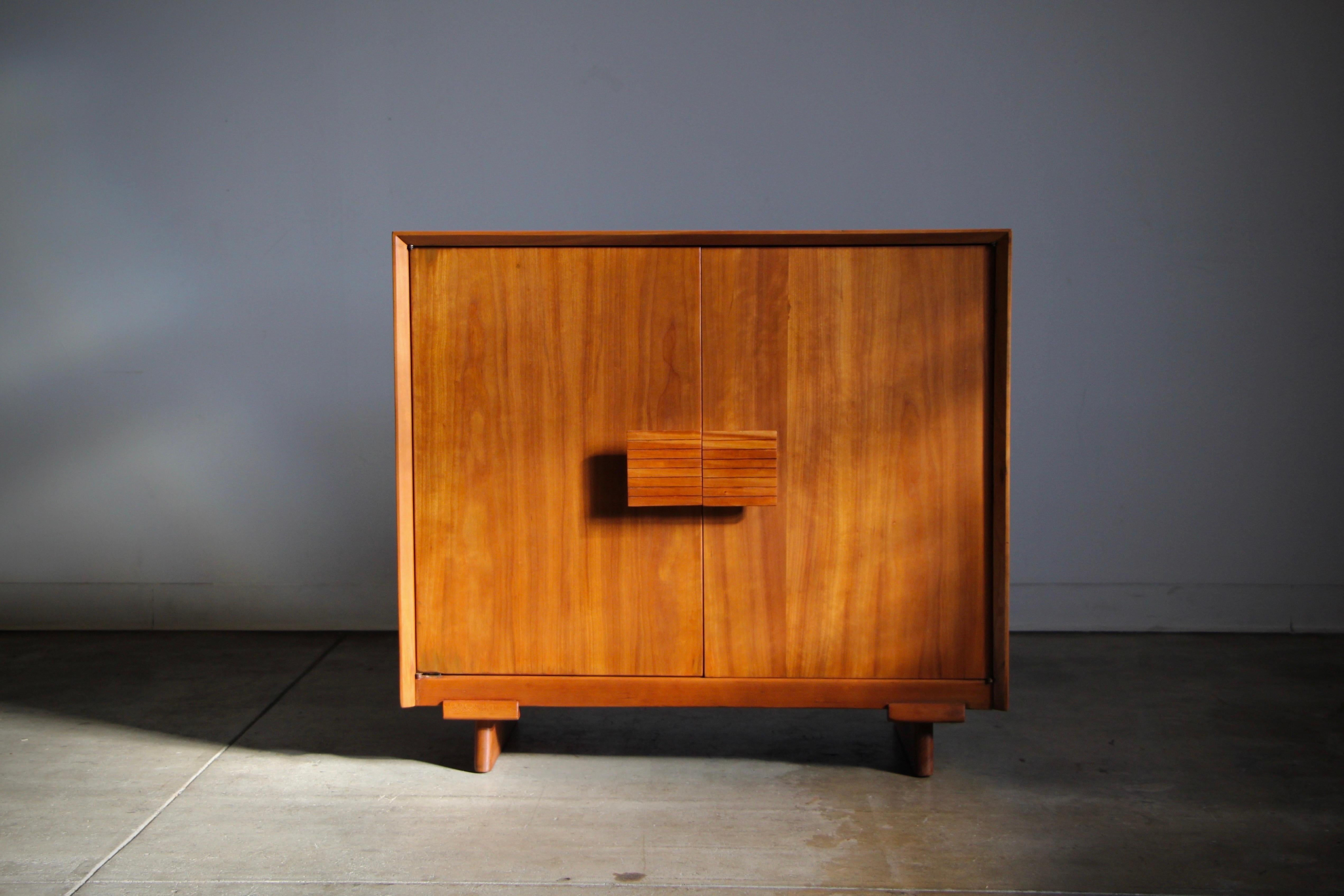 When Hans Knoll started his furniture company, he selected Jens Risom to design many of the first pieces for it. This bar cabinet, expertly crafted by Pennsylvania Dutch woodworkers out of local cherry wood in 1942, is one of the first pieces of
