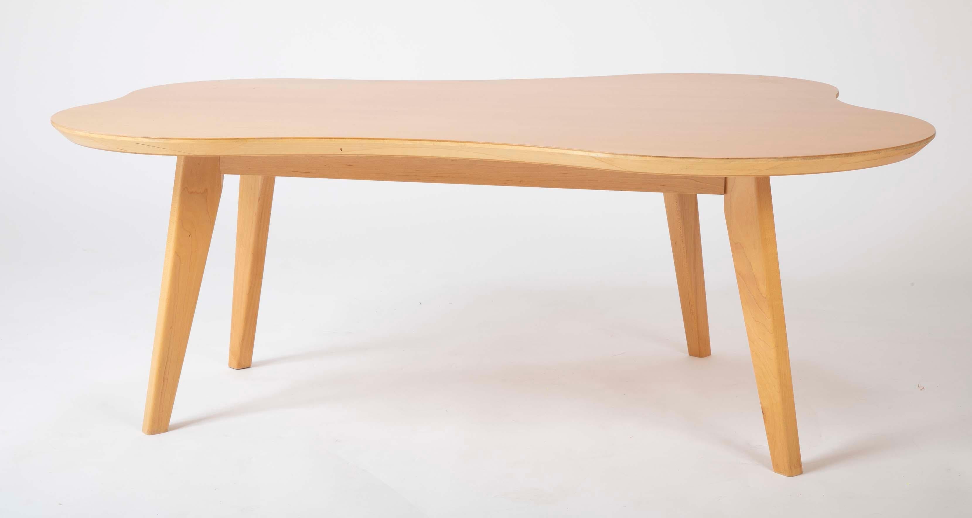 A great organic form coffee table designed by Jens Risom and produced by Knoll. Unmarked. Four available.
 