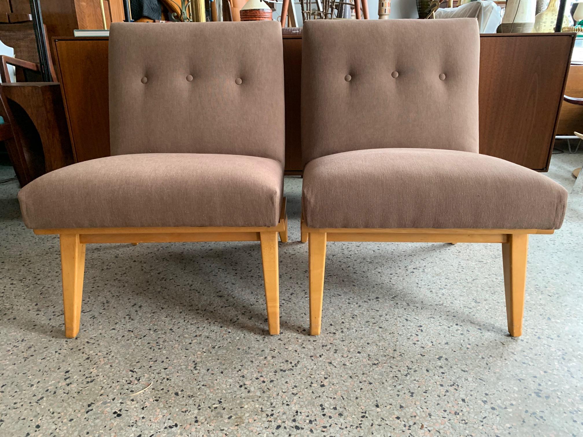 A great pair of early production Knoll, designed by Jens Risom, slipper chairs, circa 1950s with maple frames and early labels. Reupholstered in heavy cotton/denim fabric (85% cotton) by Spechler-Vogel Textiles, NYC.