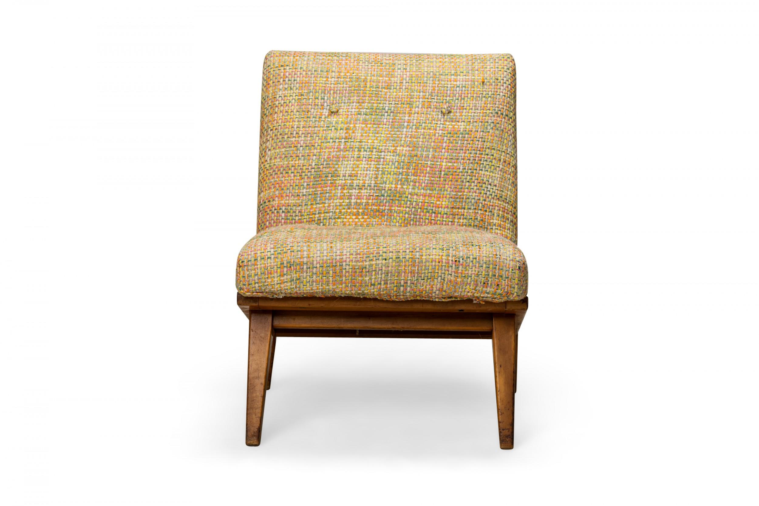 Mid-Century Modern slipper / side chair with woven multi-colored fabric upholstery, resting on an angled blonde wood base with angled and tapered legs. (Jens Risom for Knoll)(Similar pieces: DUF0452-DUF0455).
    