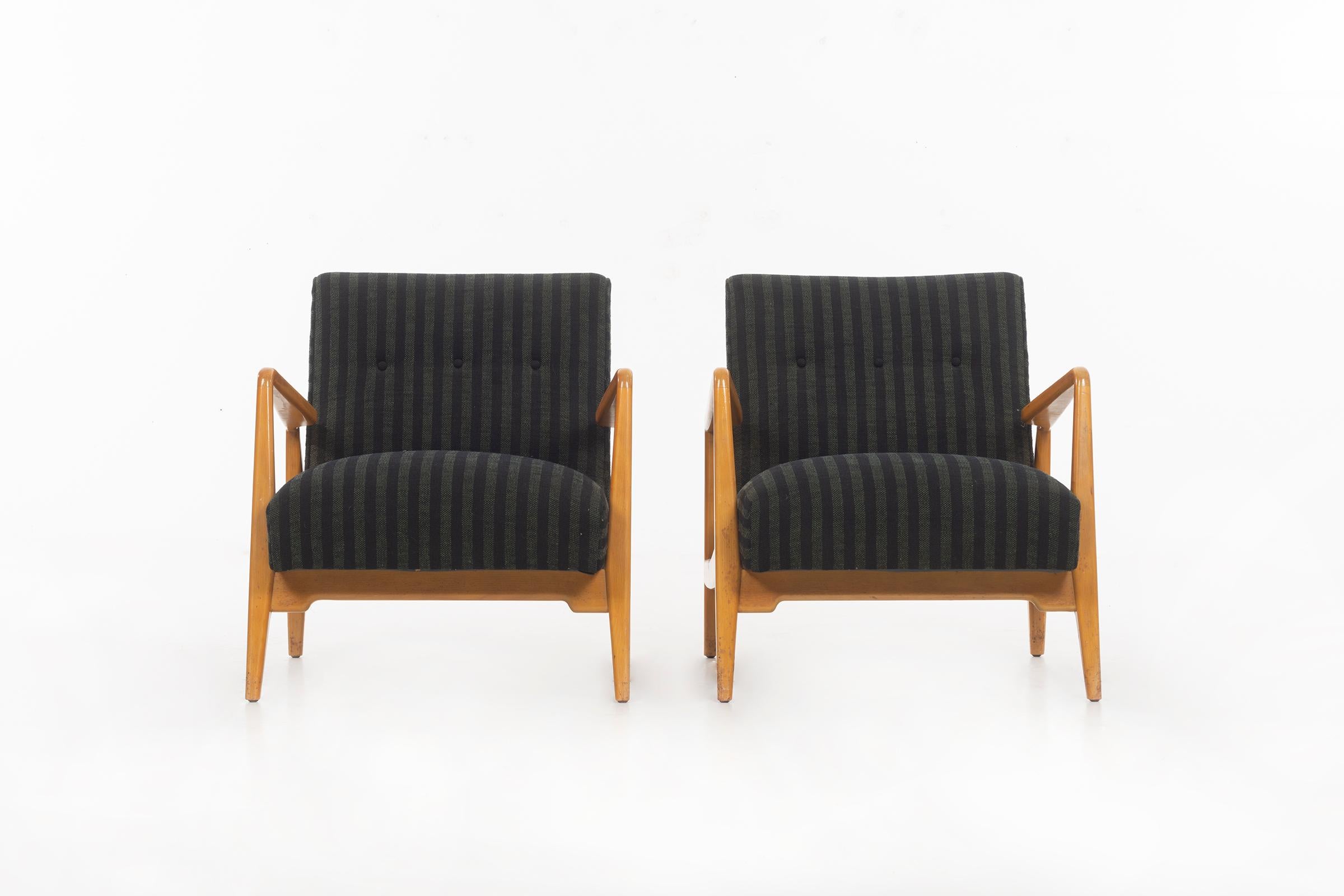 Risom for Risom Inc. pair of lounge chairs with articulated arms, original vintage condition with wear and patina on arms and legs. Upholstery original.
  