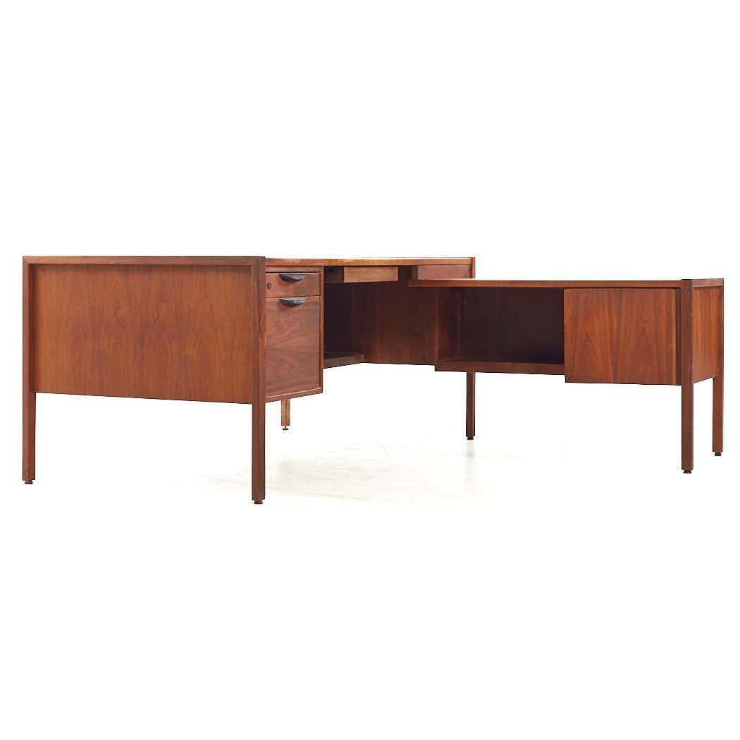 Jens Risom Mid Century Corner Desk

This desk measures: 68 wide x 72.5 deep x 28.25 high, with a chair clearance of 25 inches
The return has a height of 25.25 inches, with a chair clearance of 24.25

All pieces of furniture can be had in what we