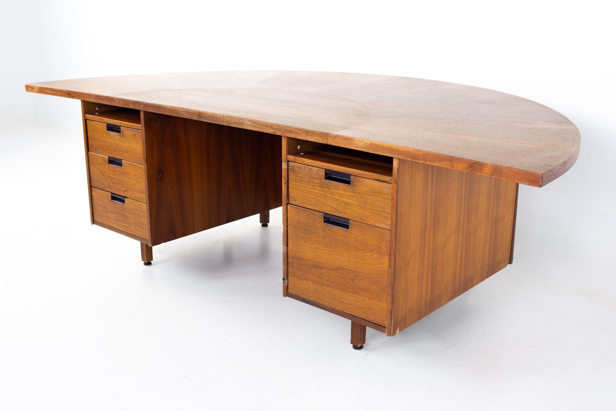 Jens Risom mid century half round executive desk.
Desk measures: 96 wide x 48 deep x 29.5 inches high

All pieces of furniture can be had in what we call restored vintage condition. That means the piece is restored upon purchase so it’s free of
