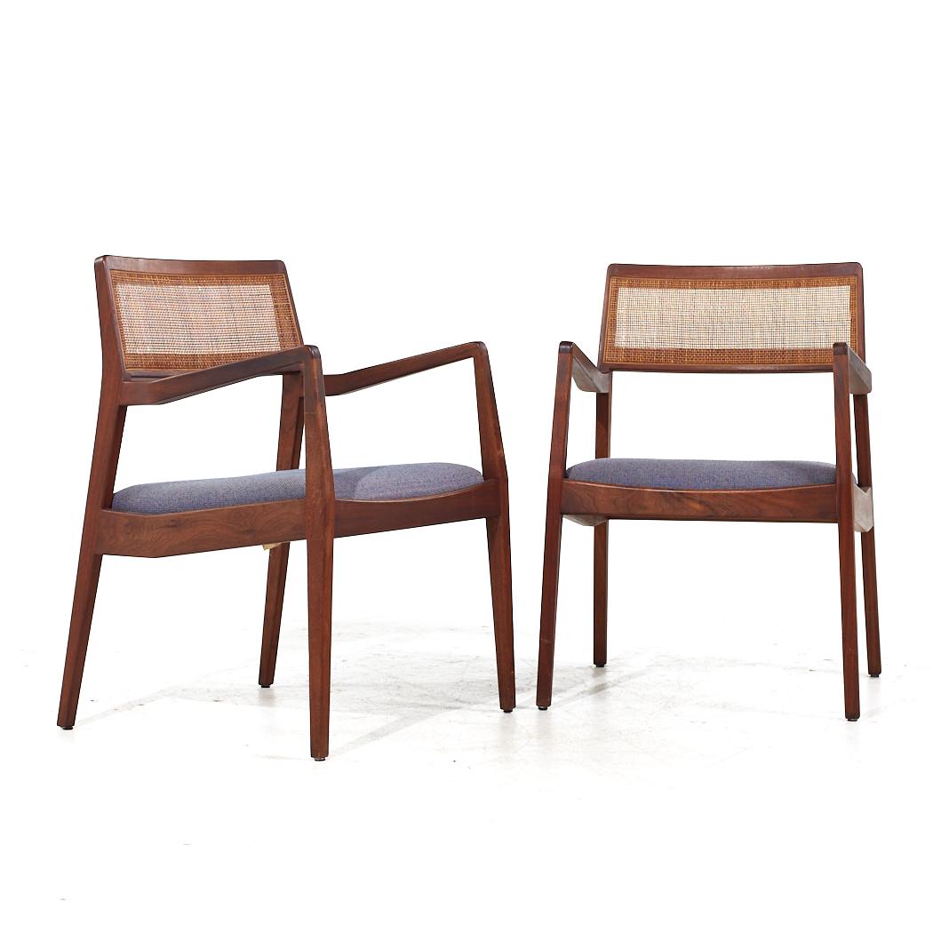 Jens Risom Mid Century Walnut and Cane Playboy Chairs - Pair

Each chair measures: 22.5 wide x 23 deep x 32.25 high, with a seat height of 18.5 and arm height/chair clearance 26.5 inches

All pieces of furniture can be had in what we call restored