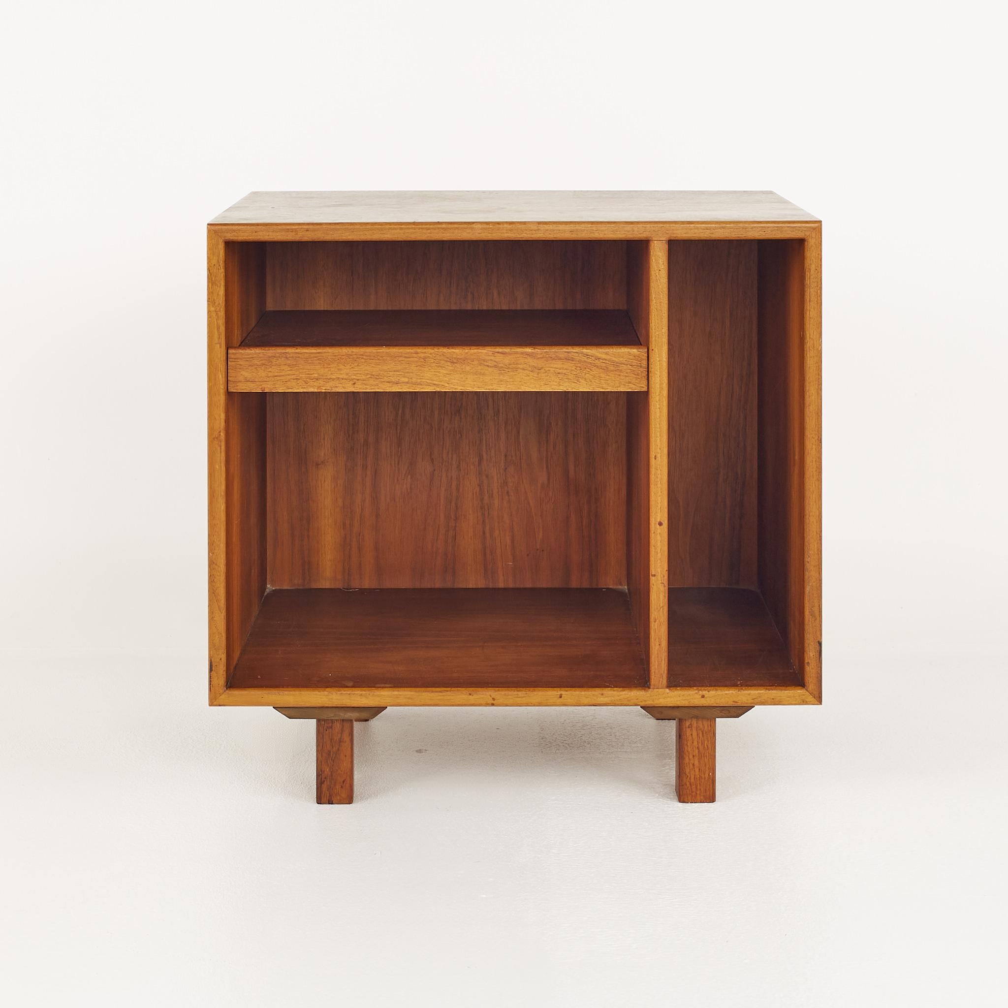 Jens Risom mid century walnut compact media console

This console measures: 24 wide x 18 deep x 23.5 inches high

?All pieces of furniture can be had in what we call restored vintage condition. That means the piece is restored upon purchase so