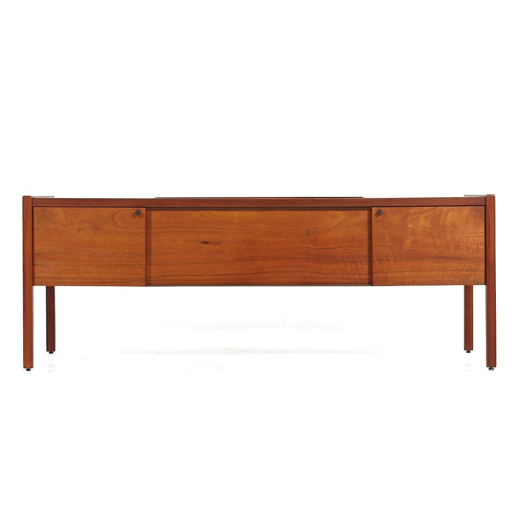 Jens Risom Mid Century Walnut Credenza

This credenza measures: 75 wide x 21 deep x 28 inches high

All pieces of furniture can be had in what we call restored vintage condition. That means the piece is restored upon purchase so it’s free of