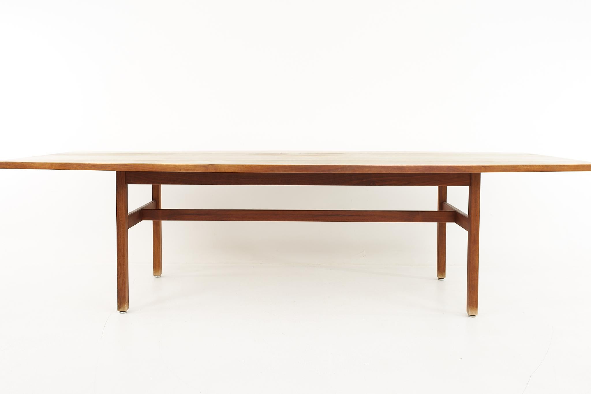 Jens Risom mid-century walnut dining table

The table measures: 108 wide x 47.75 deep x 29.5 high, with a chair clearance of 28 inches

All pieces of furniture can be had in what we call restored vintage condition. That means the piece is