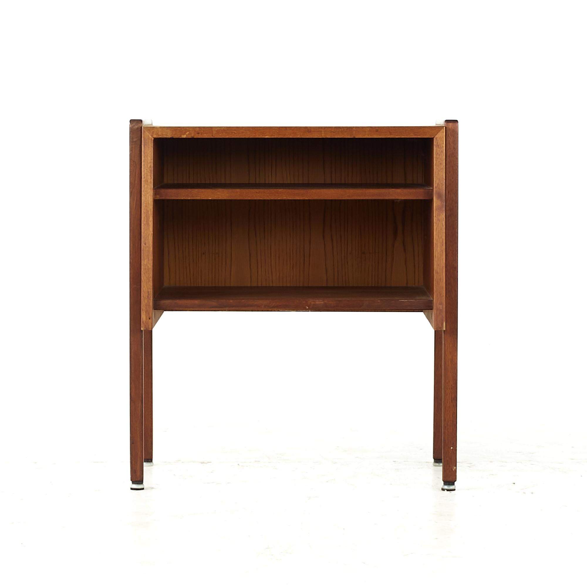 Jens Risom midcentury walnut nightstand.

This nightstand measures: 23 wide x 17 deep x 26 inches high

All pieces of furniture can be had in what we call restored vintage condition. That means the piece is restored upon purchase so it’s free of