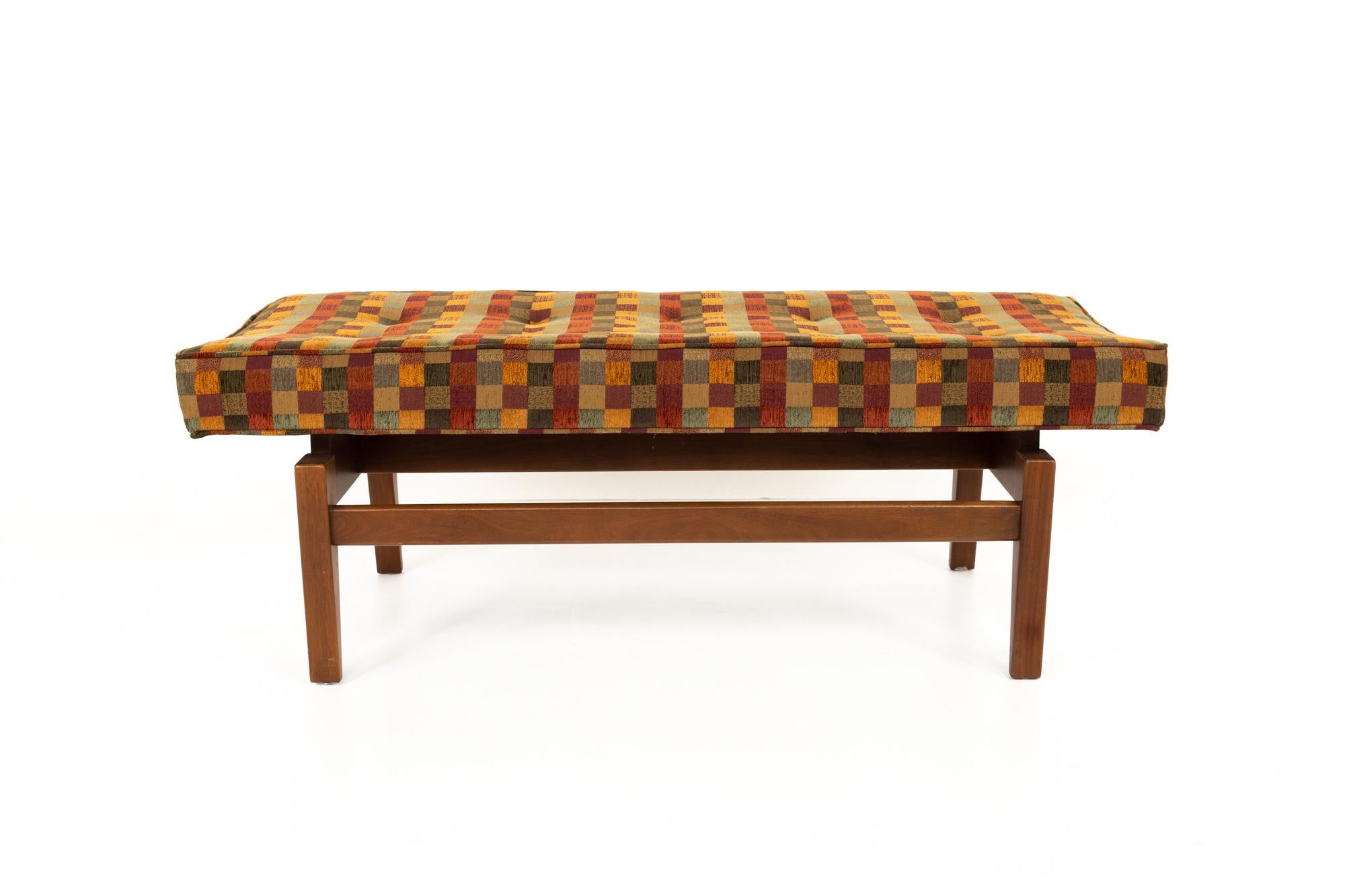 Jens Risom Mid Century upholstered walnut bench
Bench measures: 49 wide x 19 deep x 18 high

Each piece of furniture is available in what we call restored vintage condition. Upon purchase it is thoroughly cleaned and minor repairs are made - all of