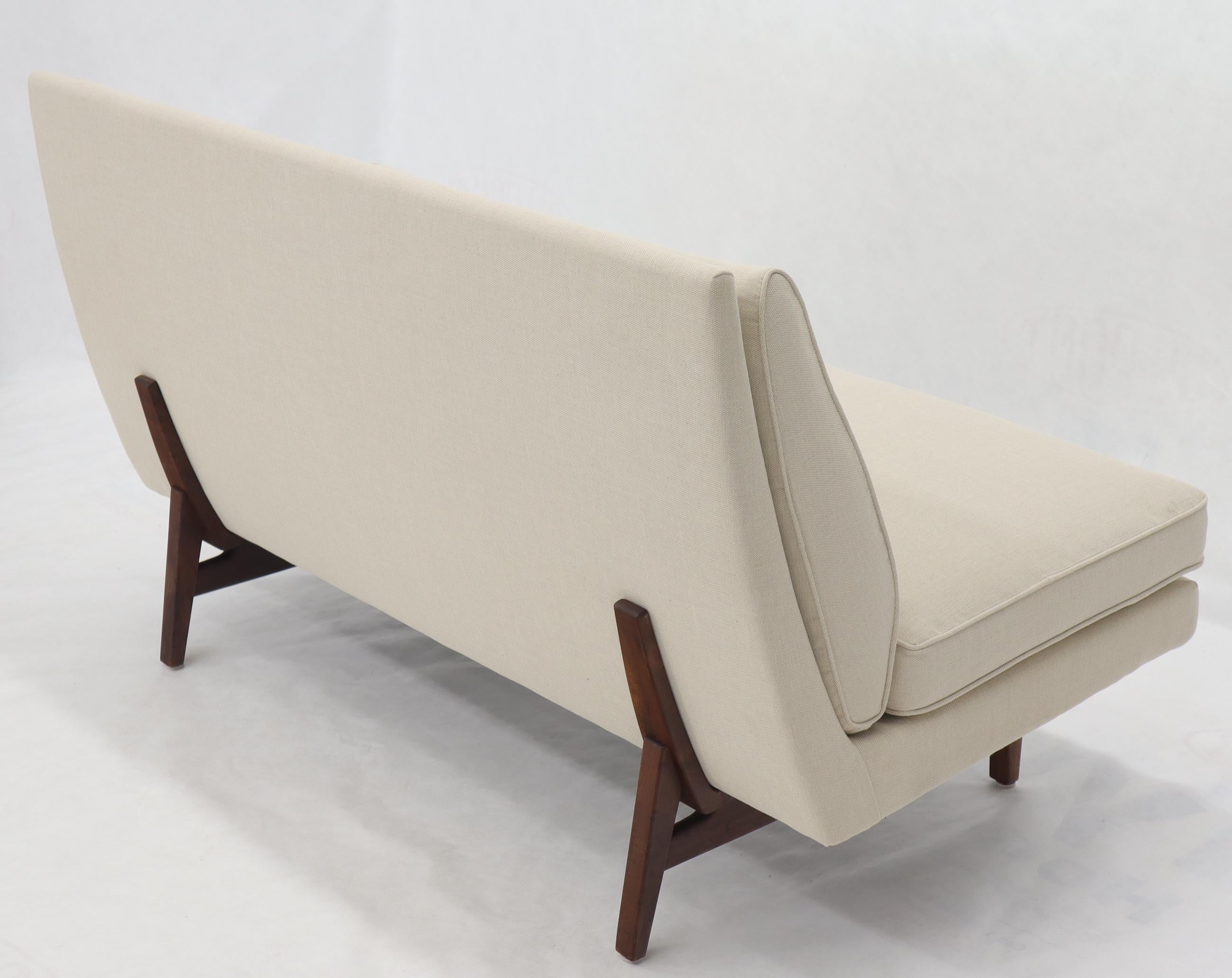 Mid-Century Modern Jens Rrisom sofa on oiled walnut legs.