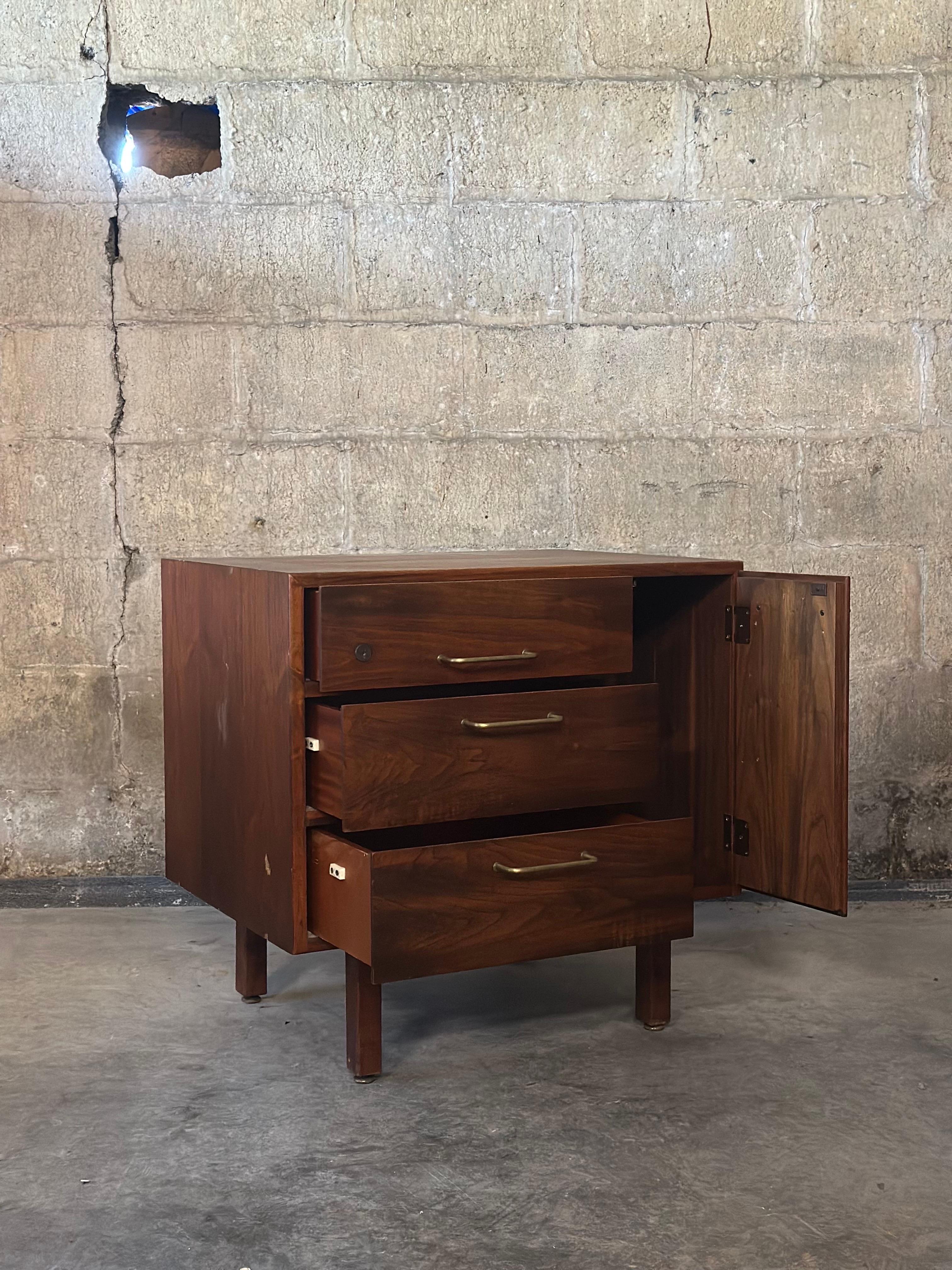 A truly beautiful piece by Jens Risom. Original oak and brass, clean lines, beautiful shape. 