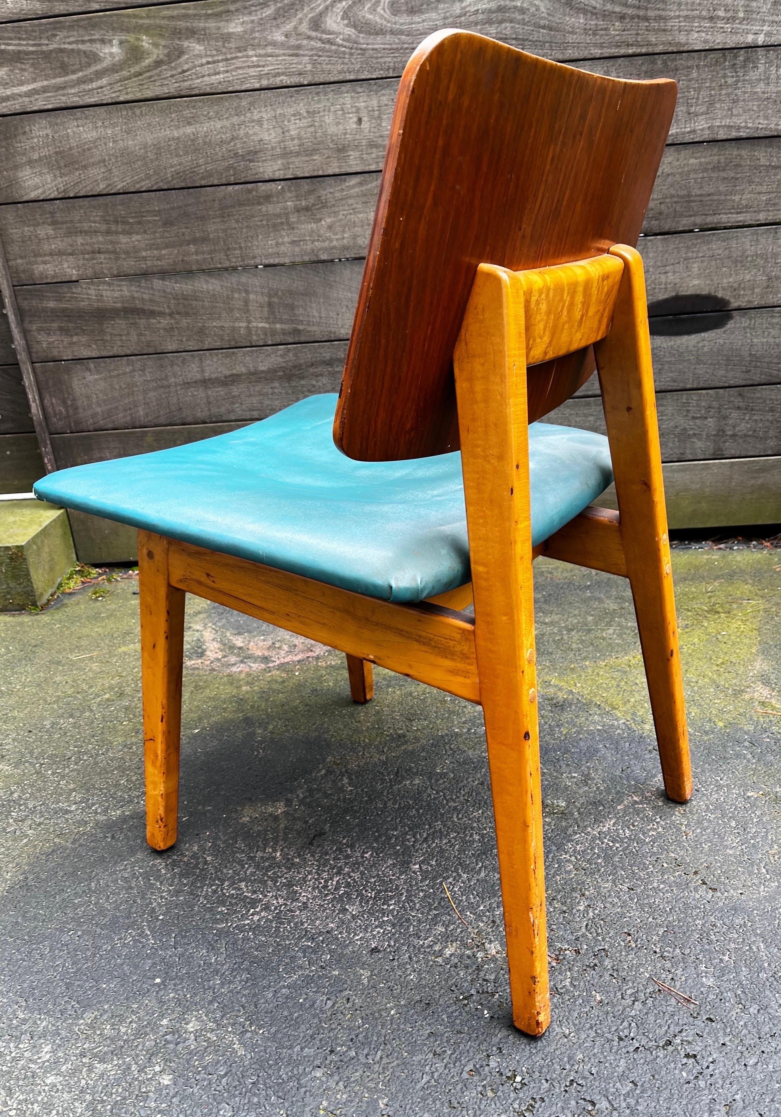 Jens Risom Side Chair c. 1940

maple frame with walnut back and original vinyl seat cover
all in original condition - untouched  - original label on the bottom 

have not been able to find another example of this exact chair
Chair was aquired form