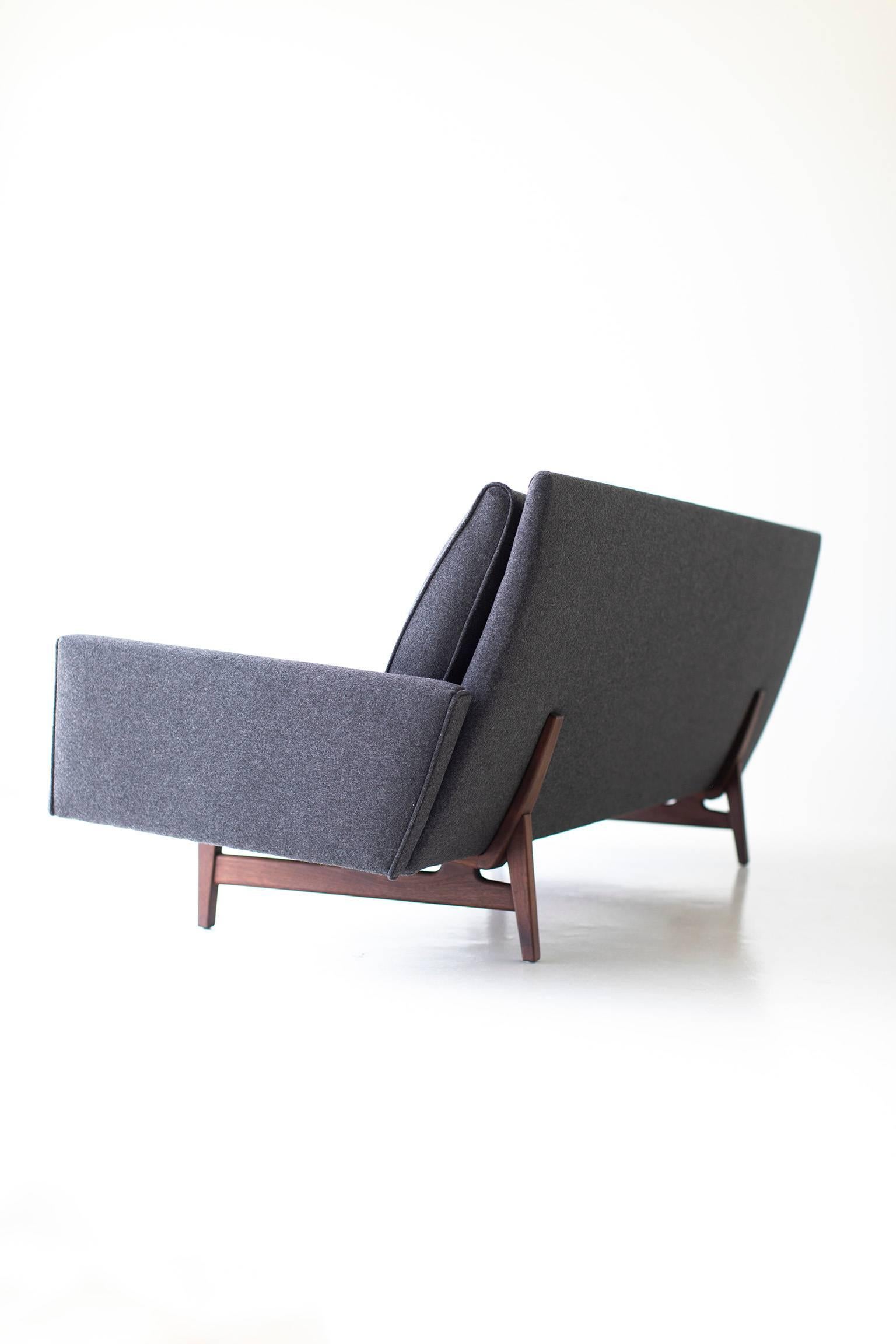 Designer: Jens Risom. 

Manufacturer: Risom Design Inc. 
Period or model: Mid-Century Modern. 
Specs: Wool, walnut. 

Condition: 

This Jens Risom sofa for Risom Design Inc. is in excellent condition. The solid walnut frame has been oiled