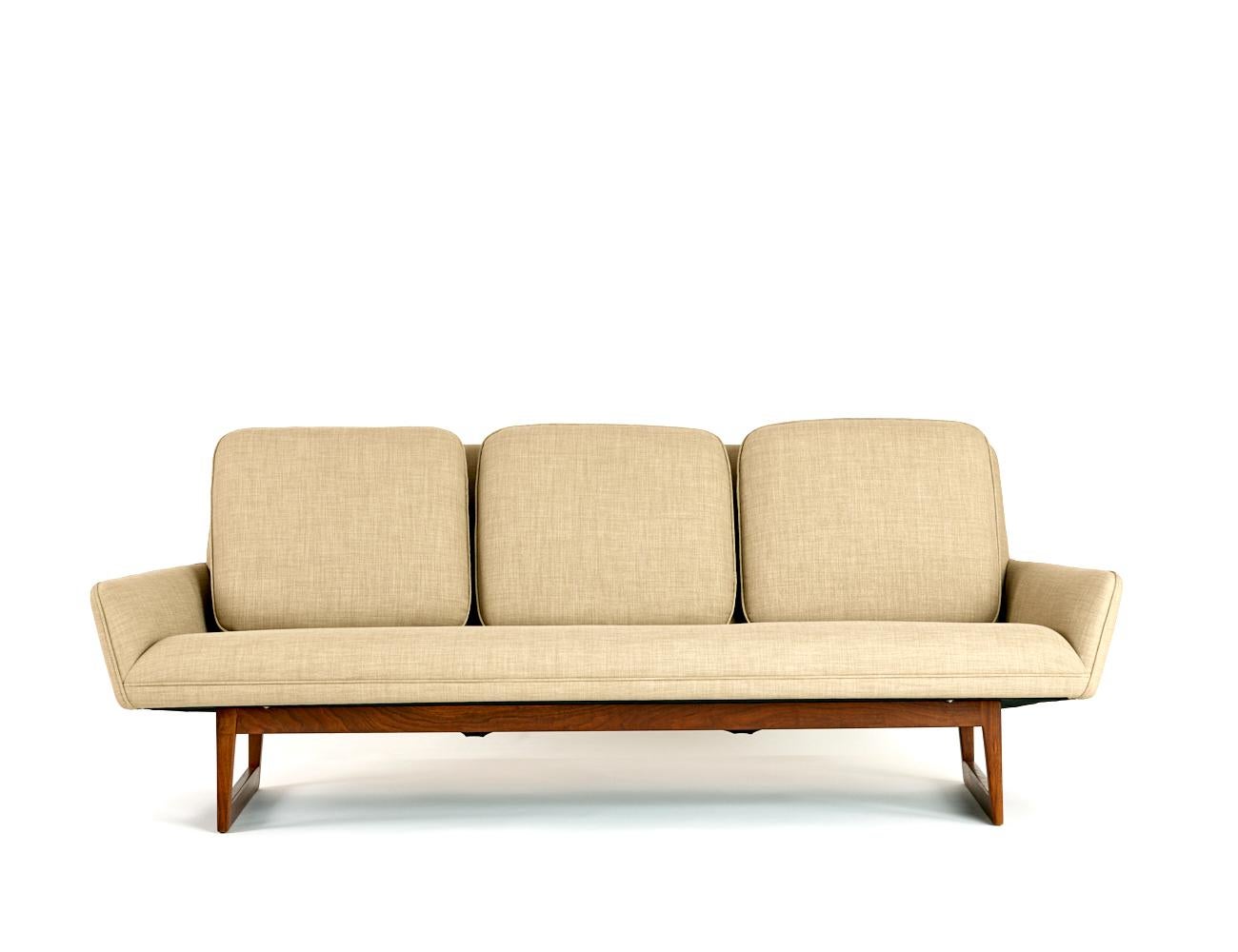 Pair of Jens Risom Sofas

USA Designed and made in the 1960s

Original teak frames with new upholstery and three back seat cushions

  