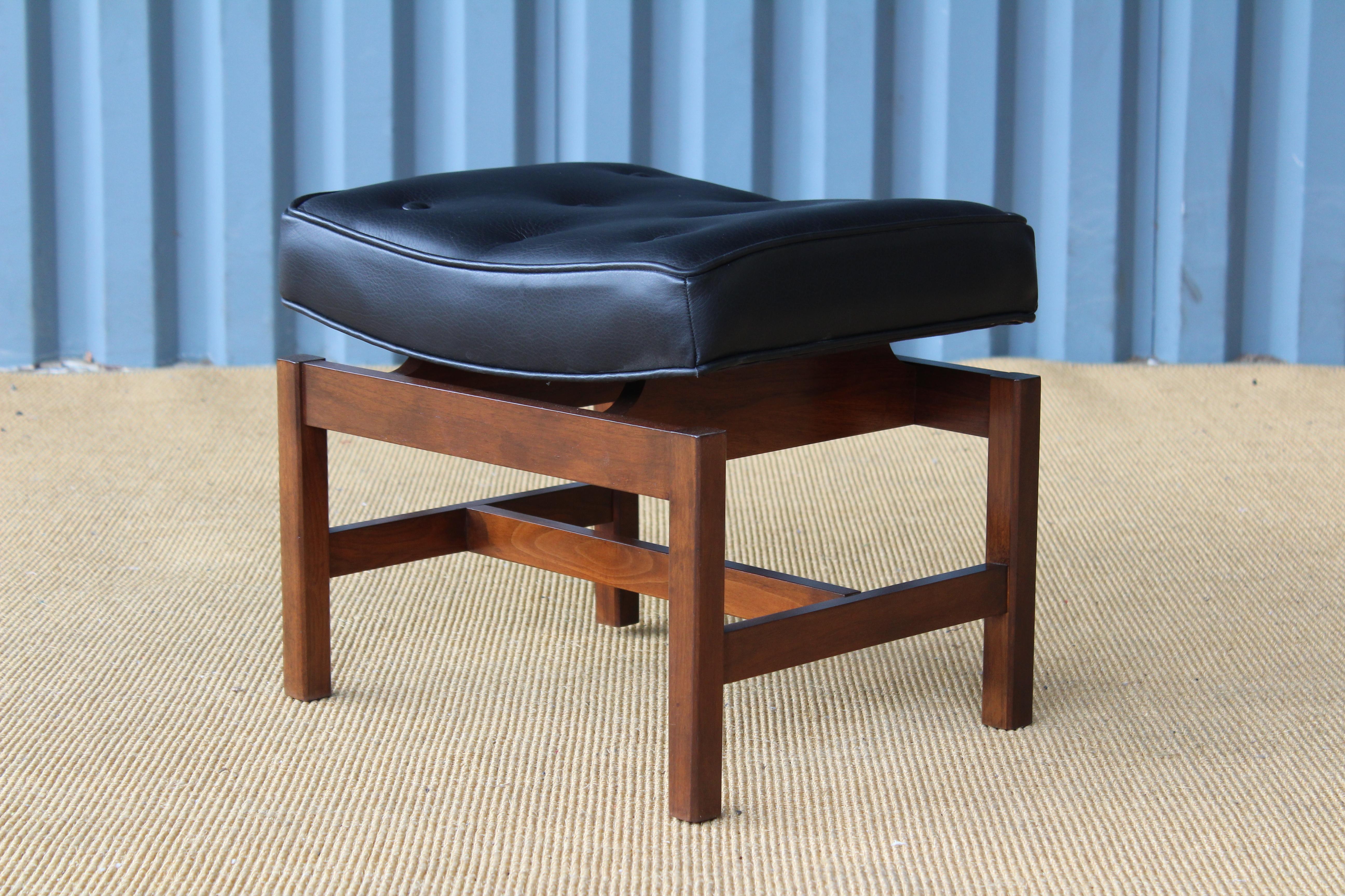 Jens Risom 'Floating' stool. Walnut base has been refinished. New tufted leather seat.