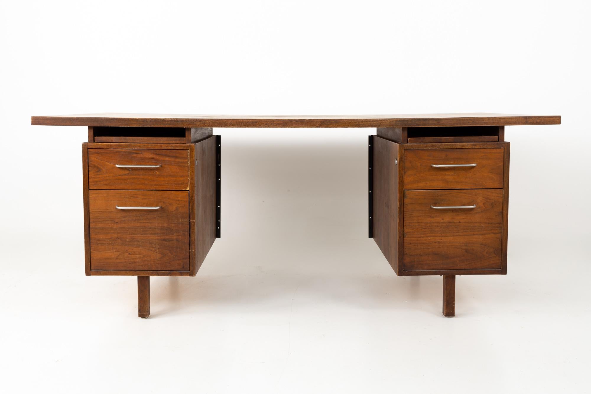 Jens Risom Style B. L. Marble Furniture Company Mid Century walnut floating top executive desk
This desk is 72 wide x 36 deep x 29.25 inches high

All pieces of furniture can be had in what we call restored intage condition. This means the piece is