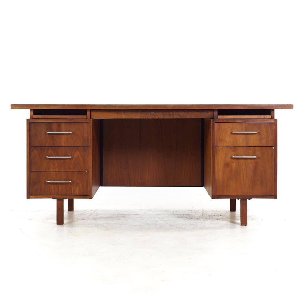 Jens Risom Style BL Marble Mid Century Walnut Executive Desk

This desk measures: 66 wide x 30 deep x 28.75 high, with a chair clearance of 25.25 inches

All pieces of furniture can be had in what we call restored vintage condition. That means the