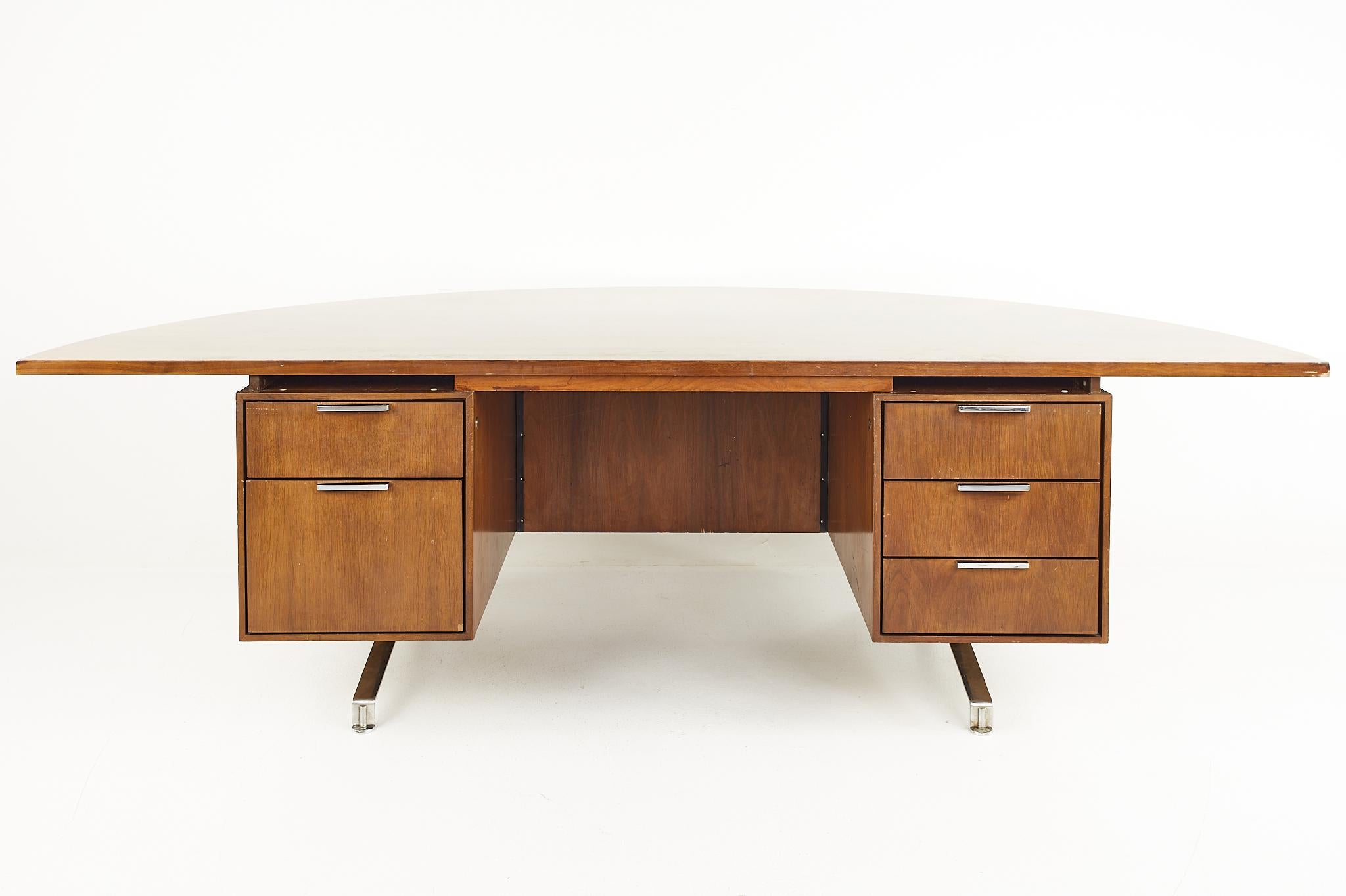 Jens Risom style mid century half round walnut executive desk

The desk measures: 95.5 wide x 47.75 deep x 29 inches high

All pieces of furniture can be had in what we call restored vintage condition. That means the piece is restored upon