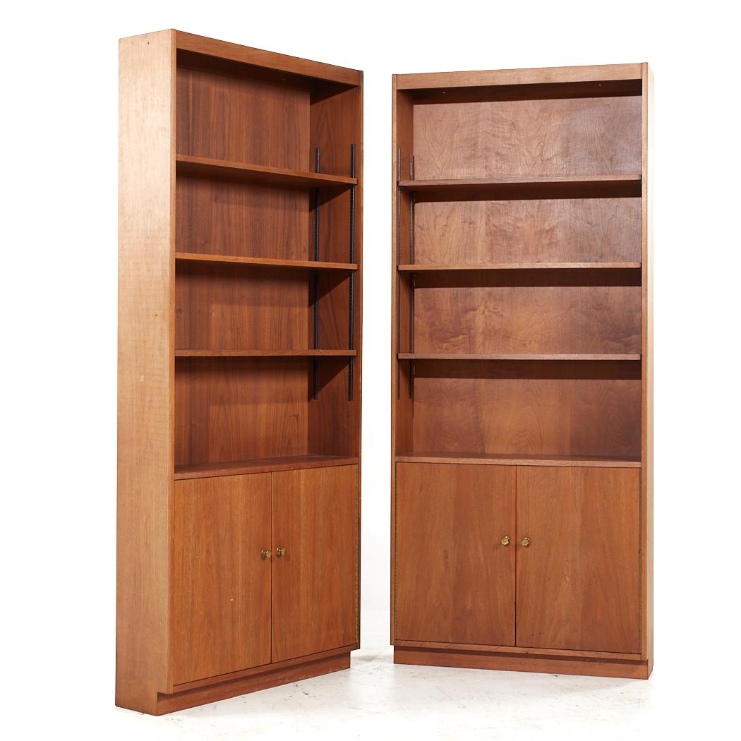 Jens Risom Style Mid Century Walnut Bookcases - Pair

Each bookcase measures: 36 wide x 10 deep x 84 inches high

All pieces of furniture can be had in what we call restored vintage condition. That means the piece is restored upon purchase so it’s