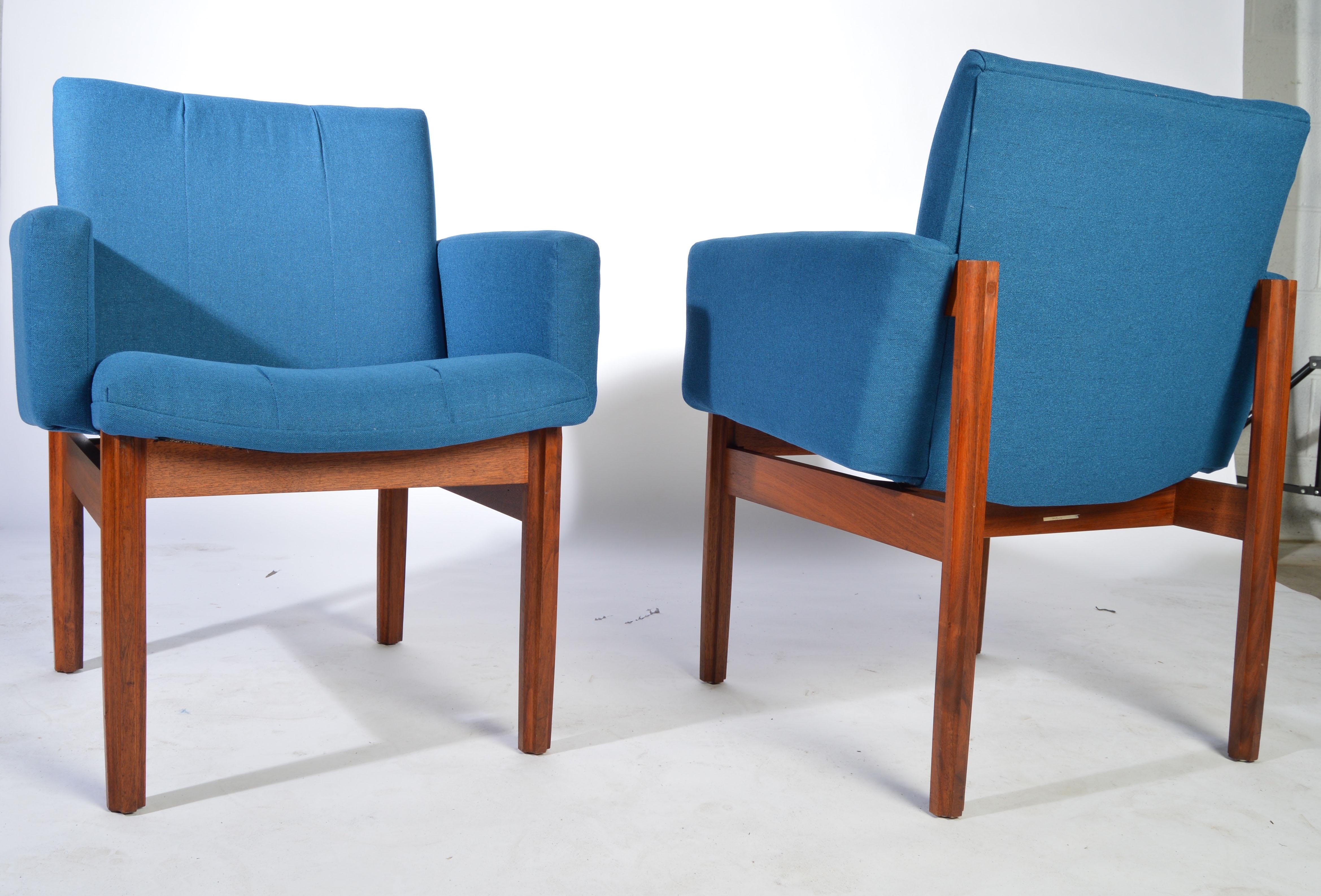 A pair of John Stuart armchairs after Jens Risom having unique teak frames and beautiful, brand new tight tweed upholstery and cushioning,
circa 1950.
Original labels attached to both chairs.