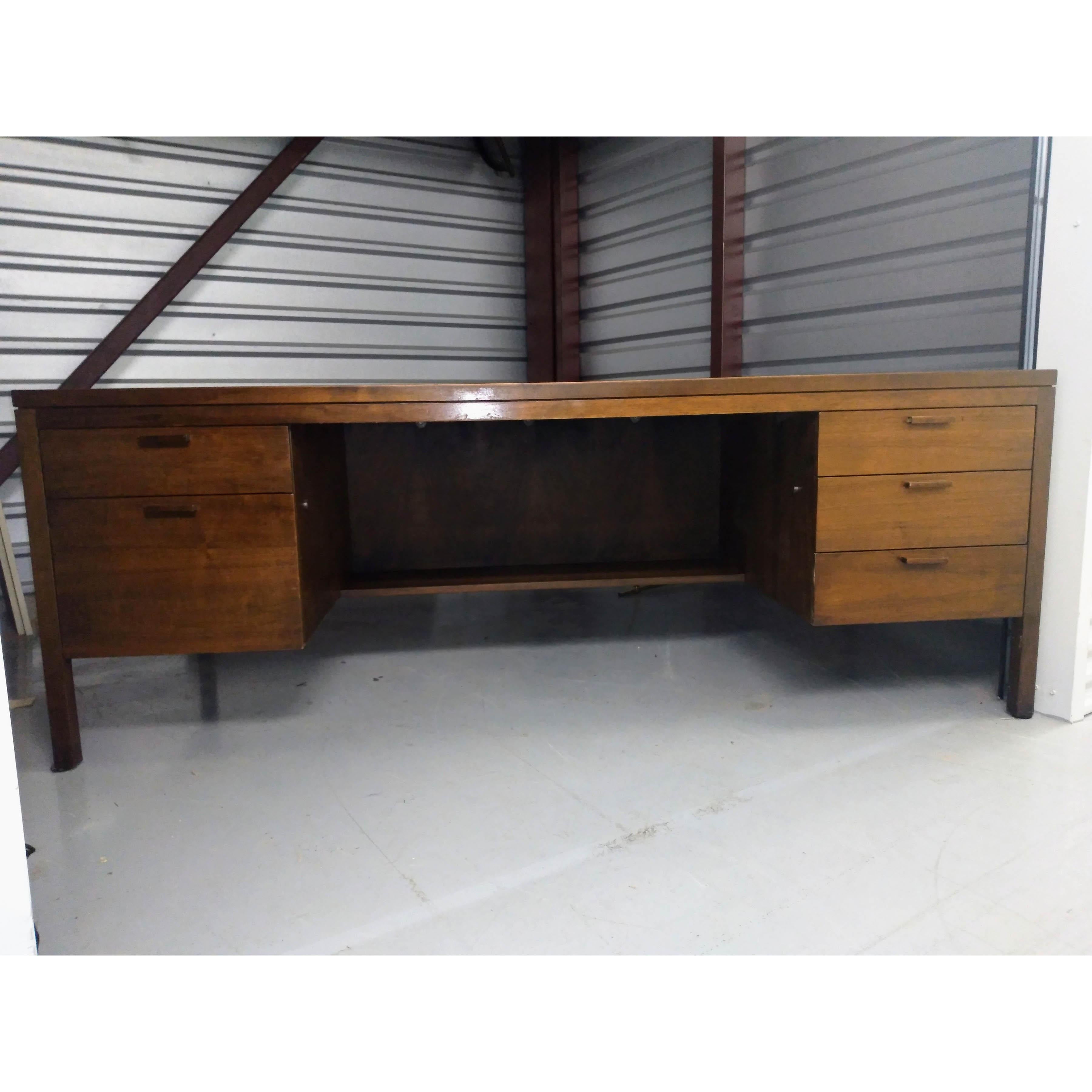 Jens Risom Executive Walnut Desk with Carpathian Elm Burl Top
1990s

Featuring 4 drawers and one file drawer. With casters.
 

77