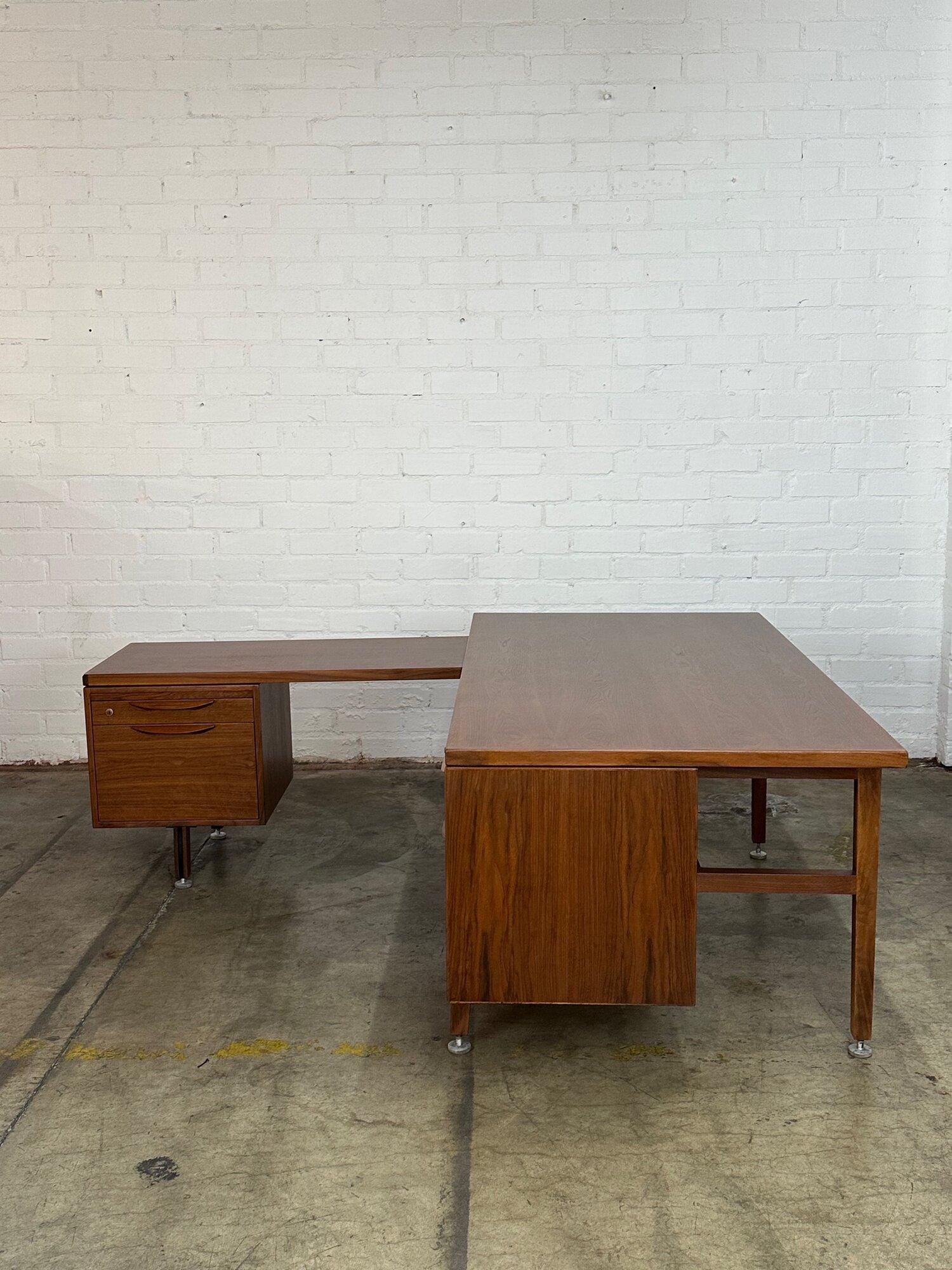 W68 D80 H29 Knee Clearance 23.5

Wide section W68 D36 H29

Side section W44 D20 H25 KC23.5

Fully restored two piece L shape desk by Jens Risom. Item has original hardware, levelers, and manufacture tag still in tact. Item is structurally
