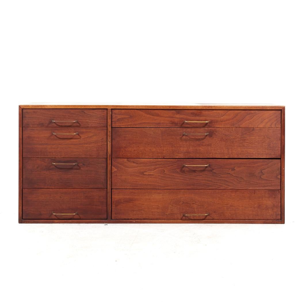 Jens Risom Wall Mounted Walnut and Brass Dresser with Fold Out Desk

This dresser measures: 54 wide x 21 deep x 24 inches high

All pieces of furniture can be had in what we call restored vintage condition. That means the piece is restored upon